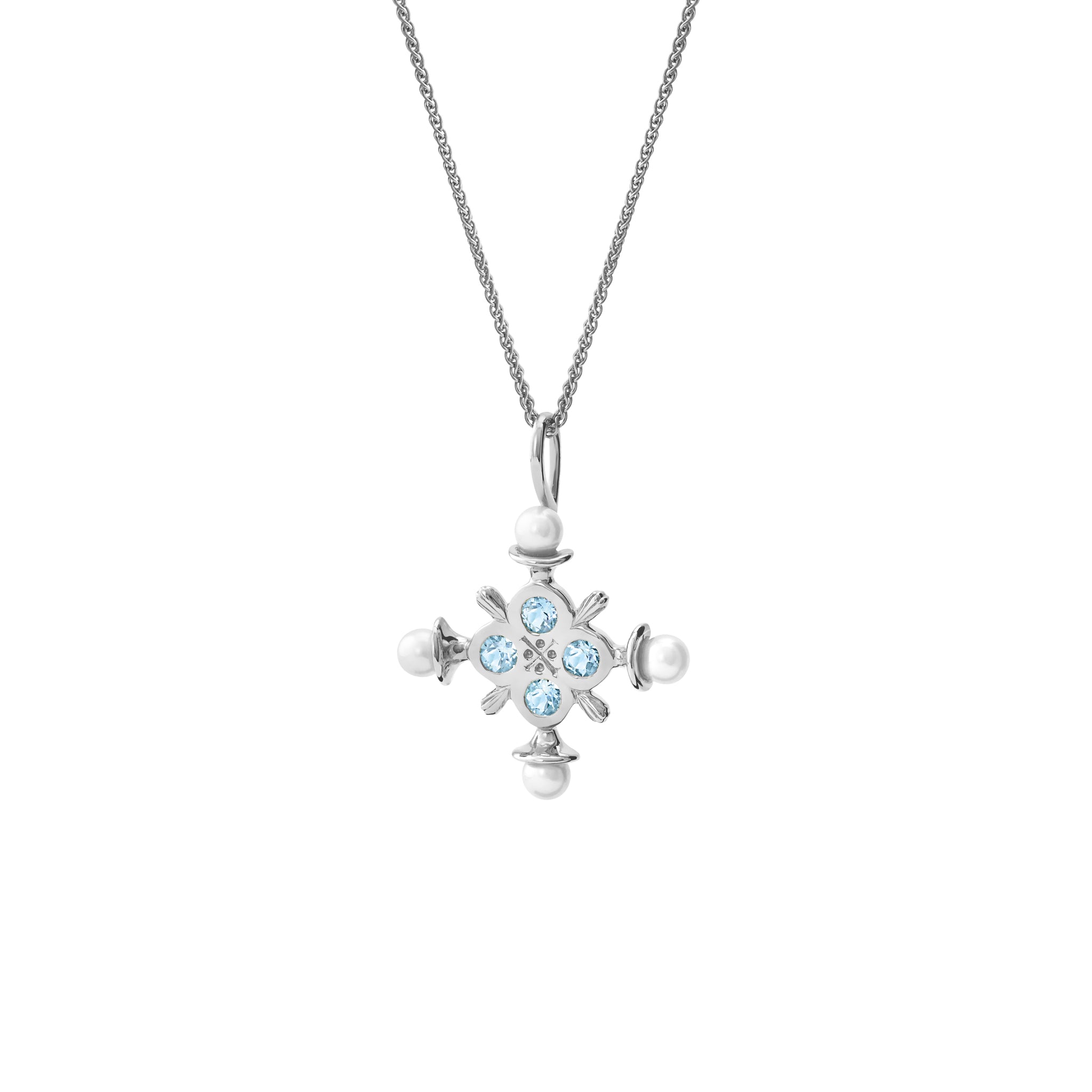 Handcrafted sterling silver cross pendant with blue topaz and pearls, birthstone of November.