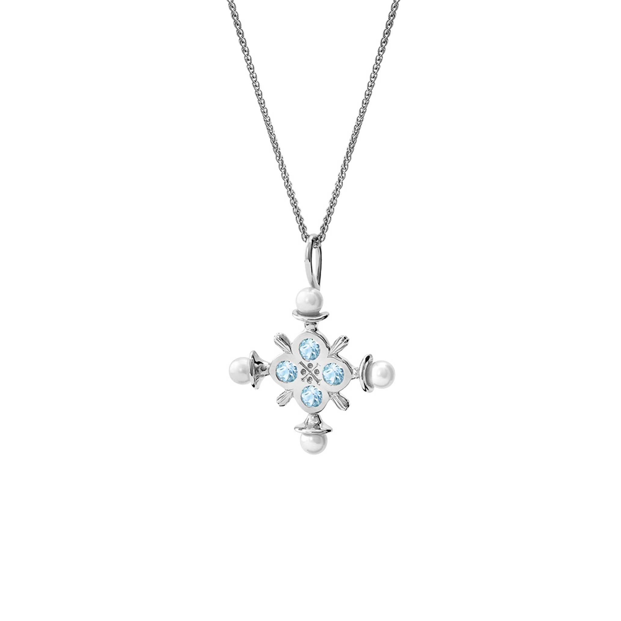 Handcrafted sterling silver cross pendant with blue topaz and pearls, birthstone of November.