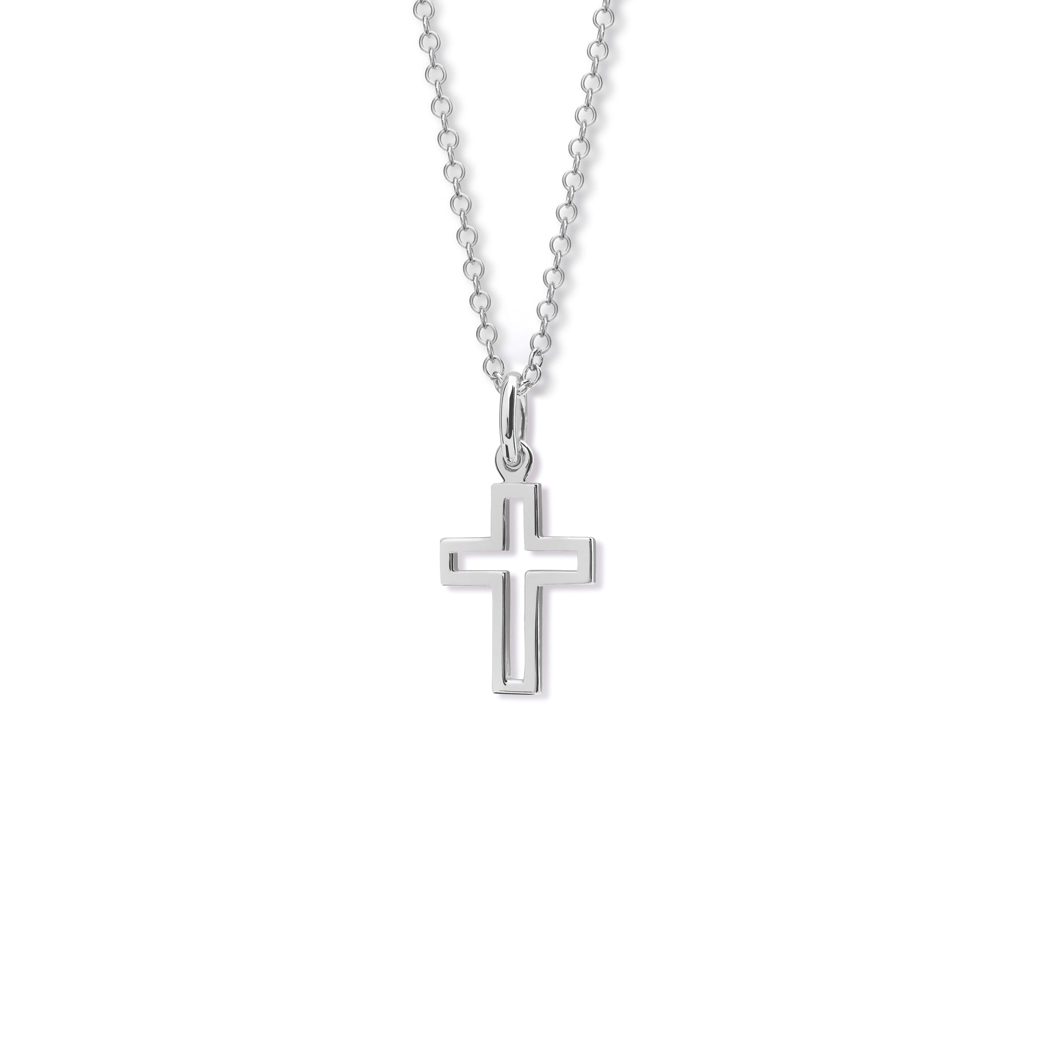 Handcrafted sterling silver pendant featuring a minimalist cross outline with a small cross-shaped cutout at the centre, hanging from a silver chain.