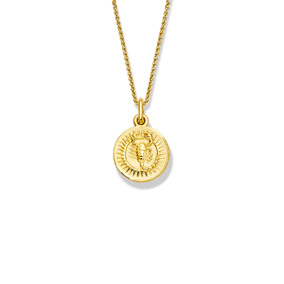 Handcrafted round yellow gold necklace pendant engraved with the zodiac scorpio.