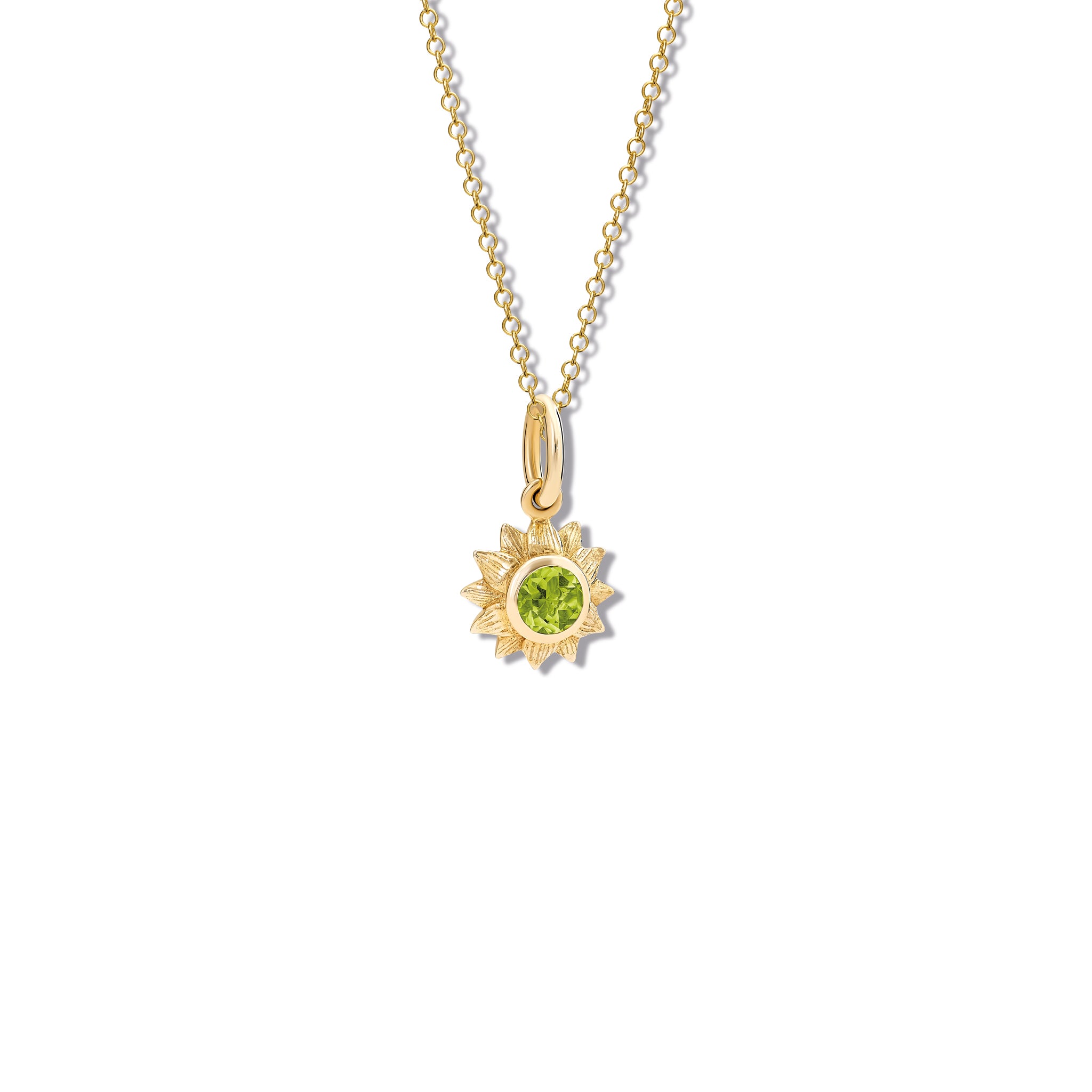 Handcrafted yellow gold sunflower necklace pendant featuring a central peridot, birthstone of August.