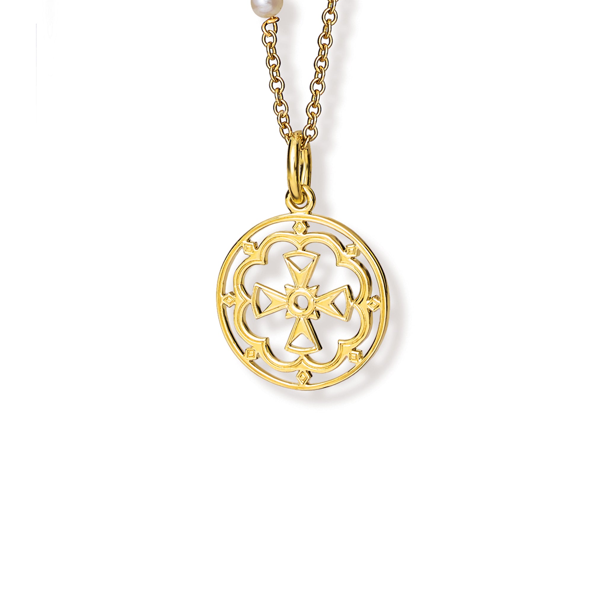 Handcrafted round yellow gold necklace pendant  featuring a cross in the middle, hanging from a gold chain.