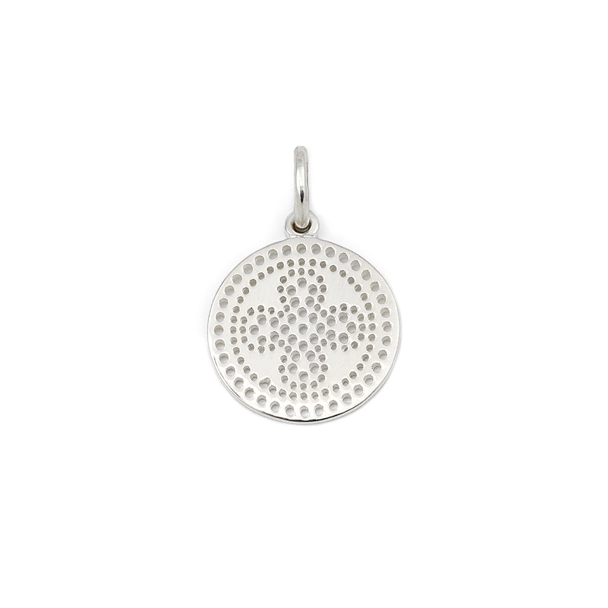 Handcrafted sterling silver necklace pendant featuring a pierced cross pattern.
