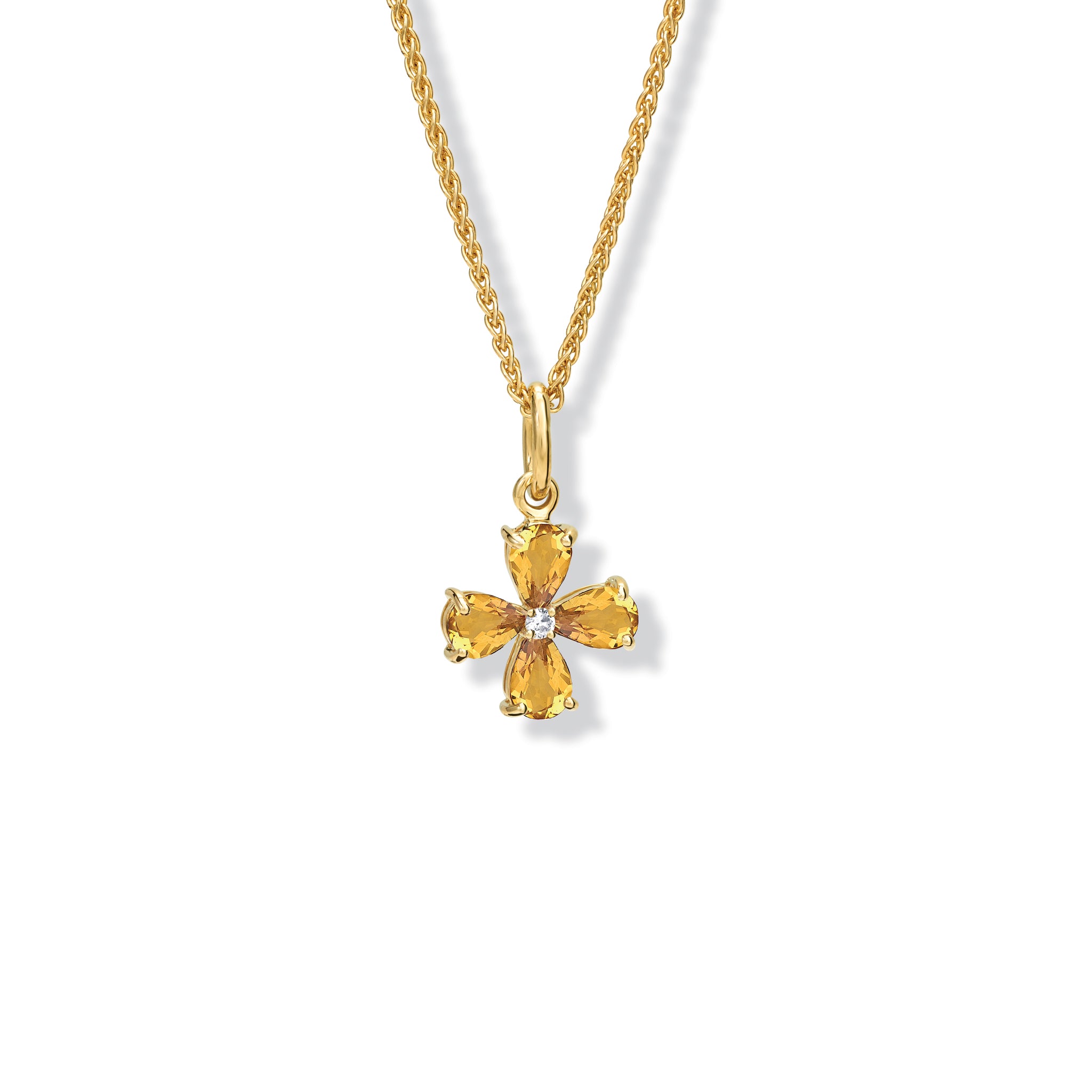 Handcrafted yellow gold four-leaf clover necklace pendant with citrine and diamond, birthstone of November.