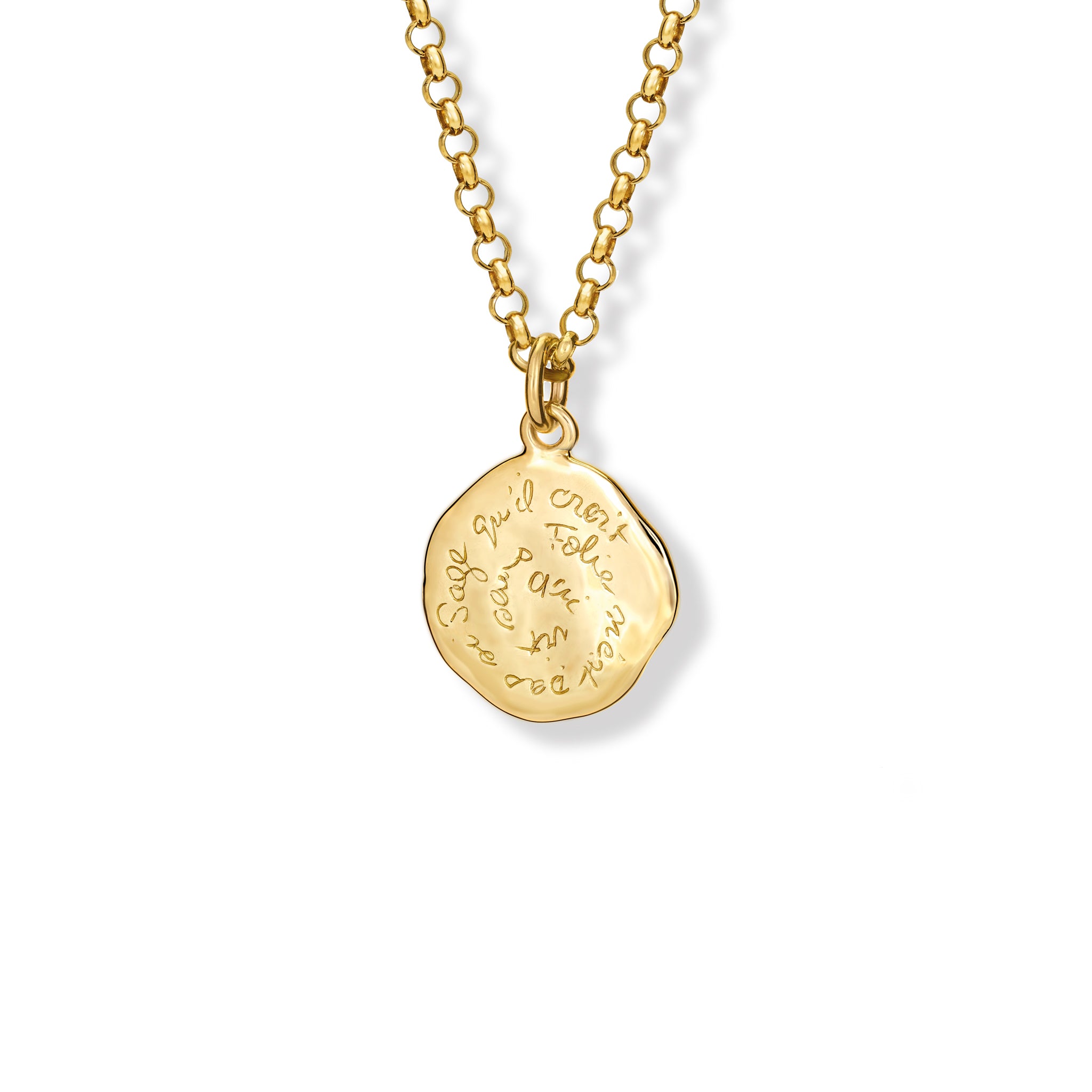 Handcrafted 18ct yellow gold necklace pendant engraved with the quote, 'Qui vit sans folie n'est pas si sage qu'il croit.' 
