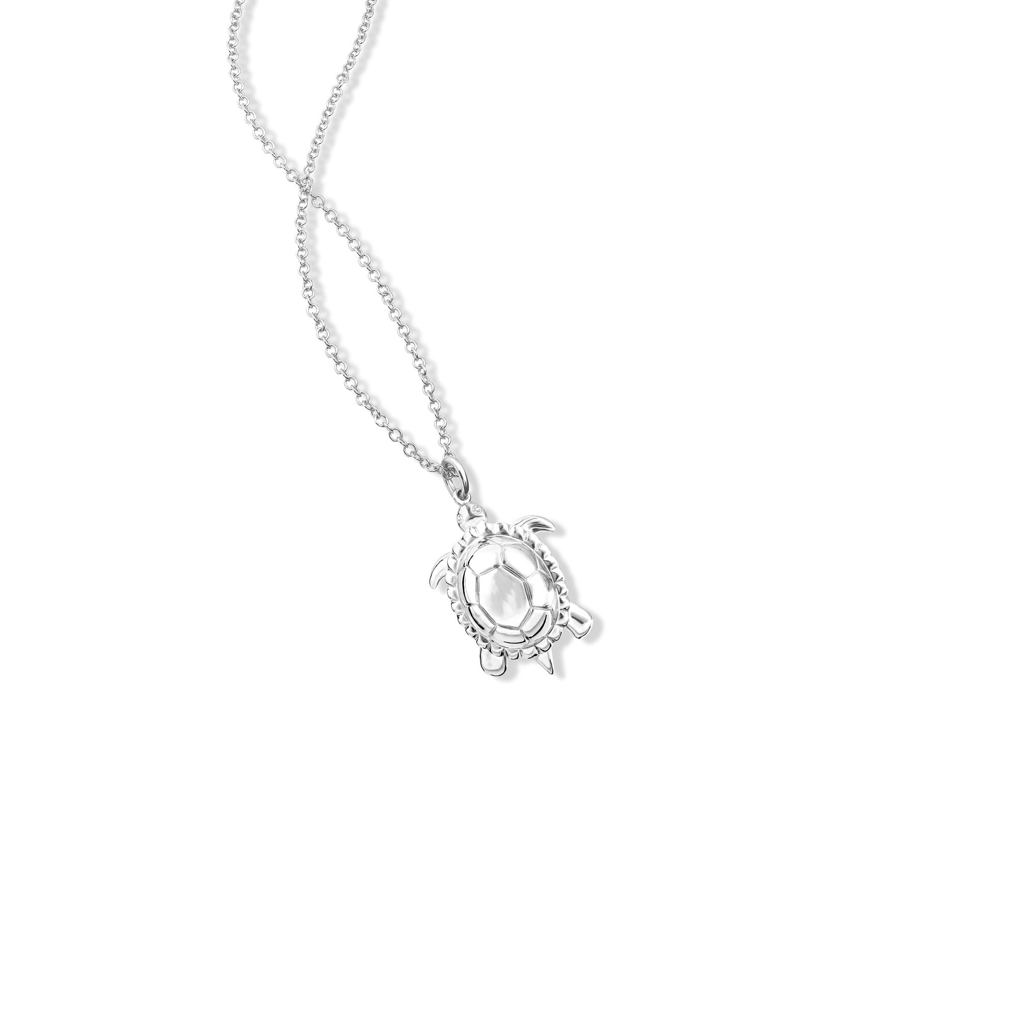 Handcrafted sterling silver turtle shaped necklace pendant.
