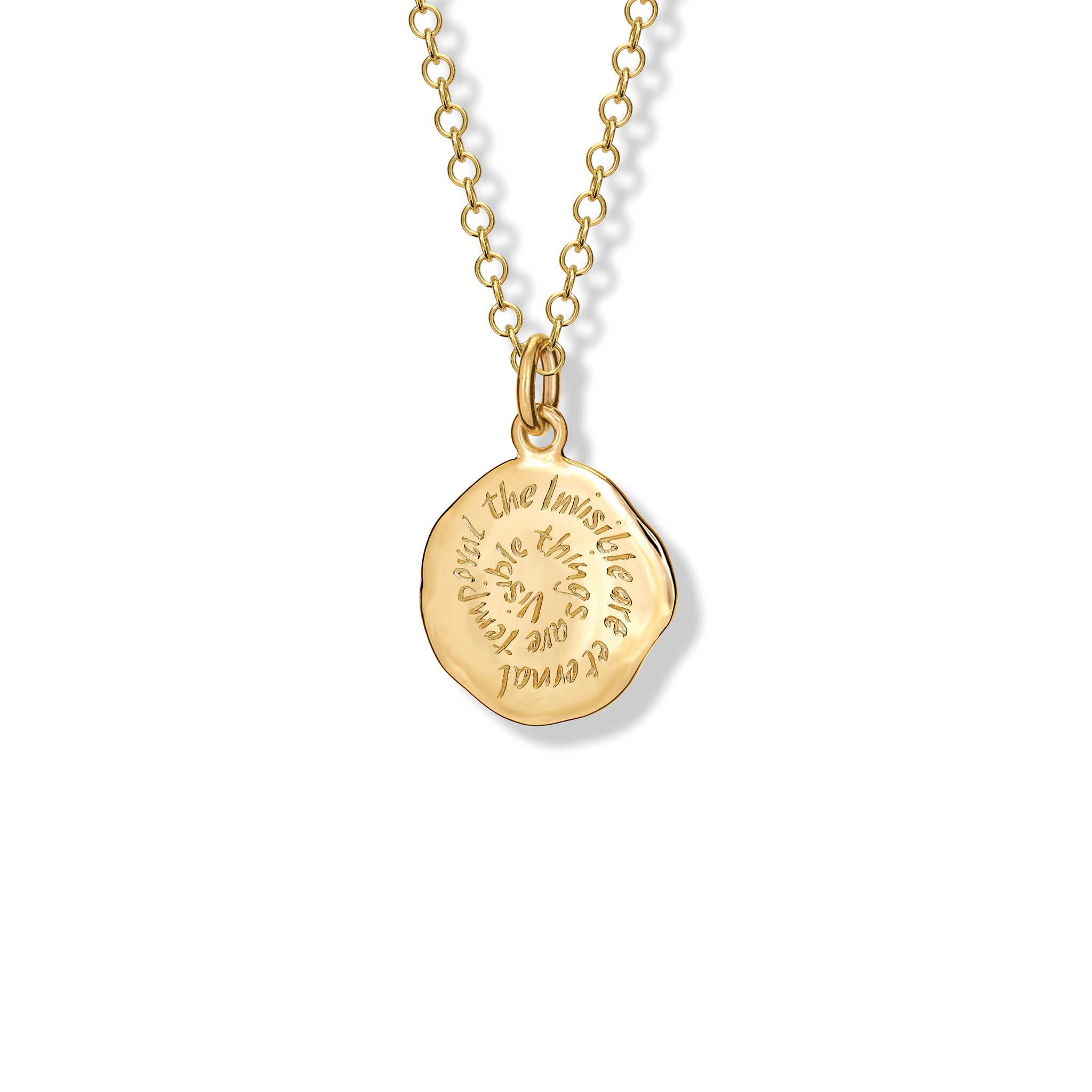 Handcrafted yellow gold necklace pendant engraved with the quote, 'Visible things are temporal, the Invisible are eternal.'
