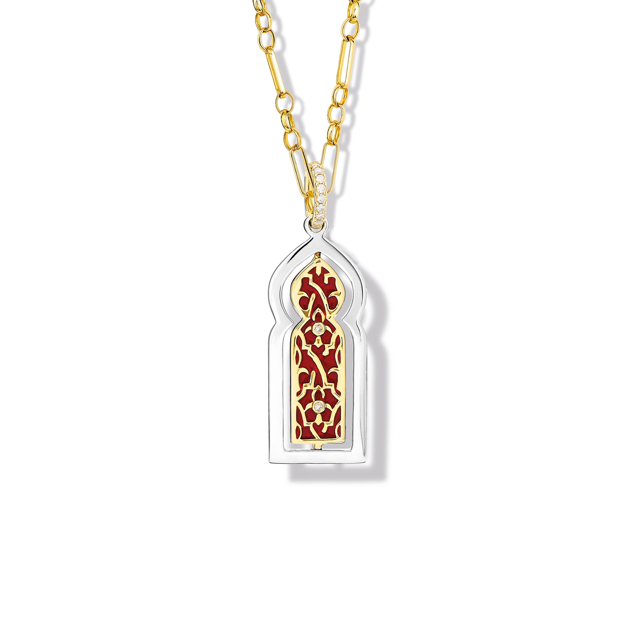 A handcrafted necklace pendant shaped like an Moroccan door in precious metal featuring diamonds and enamel.