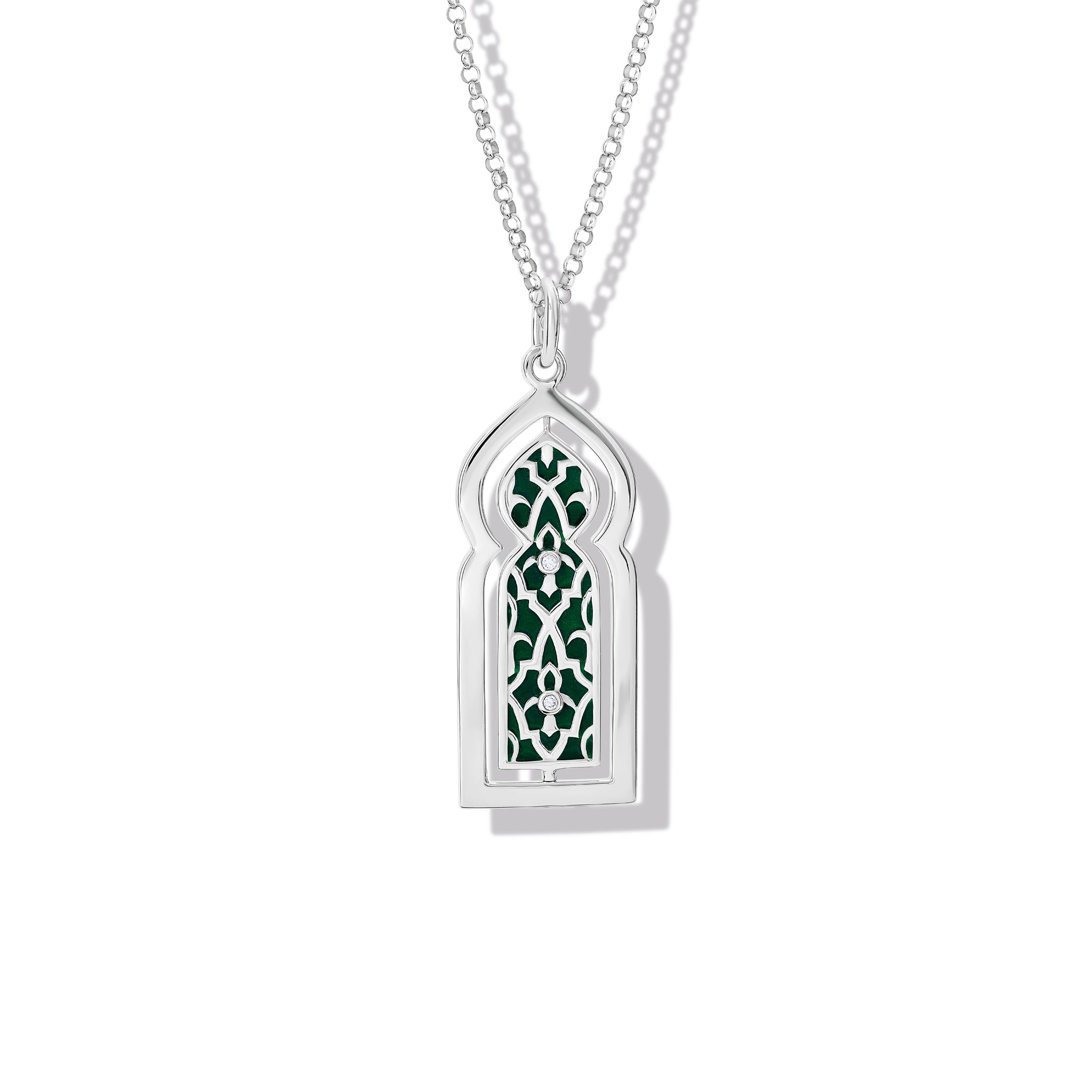 Handcrafted sterling silver necklace pendant featuring a narrow door with green enamel and diamonds.
