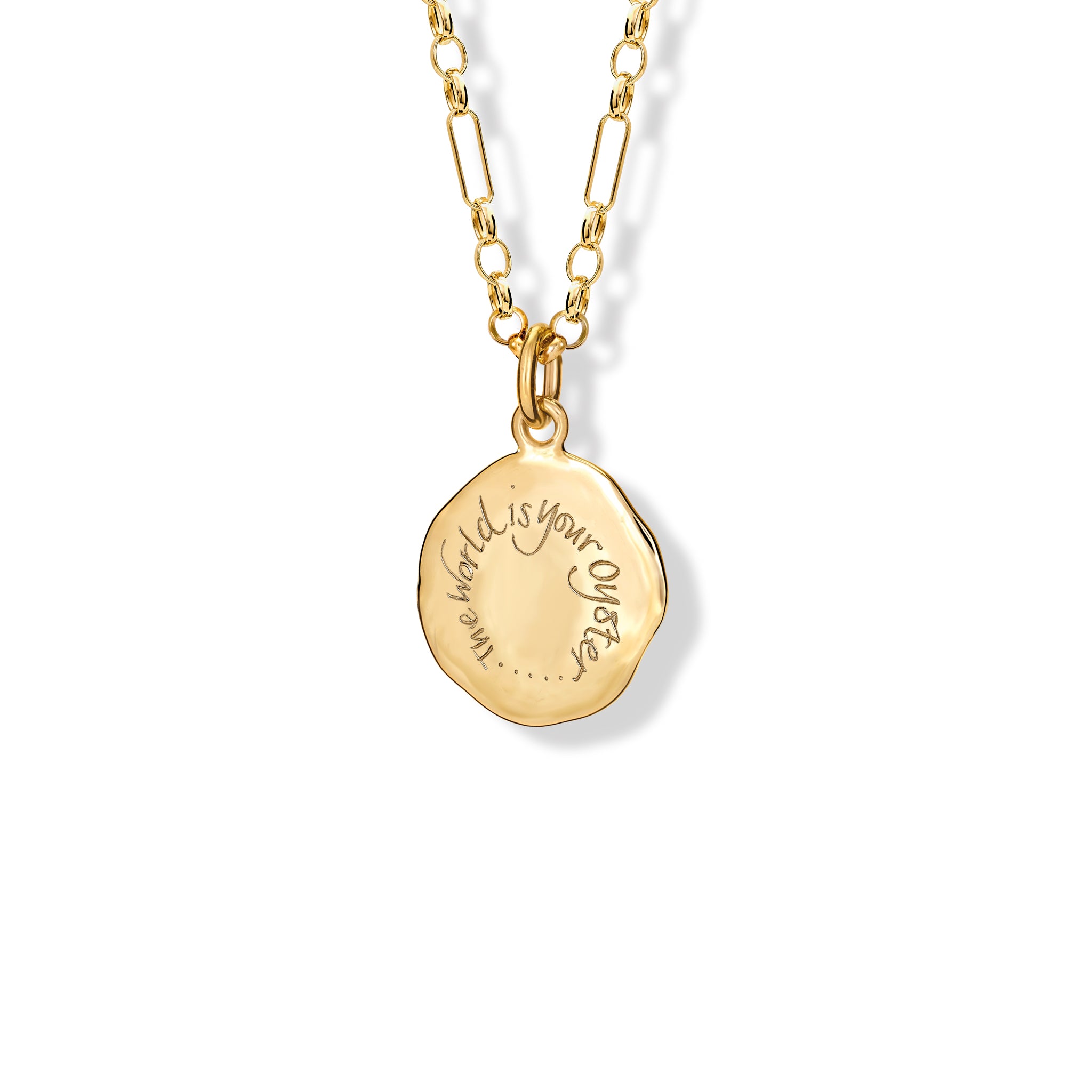 Handcrafted yellow gold round necklace pendant engraved with the quote 'The world is your oyster.'
