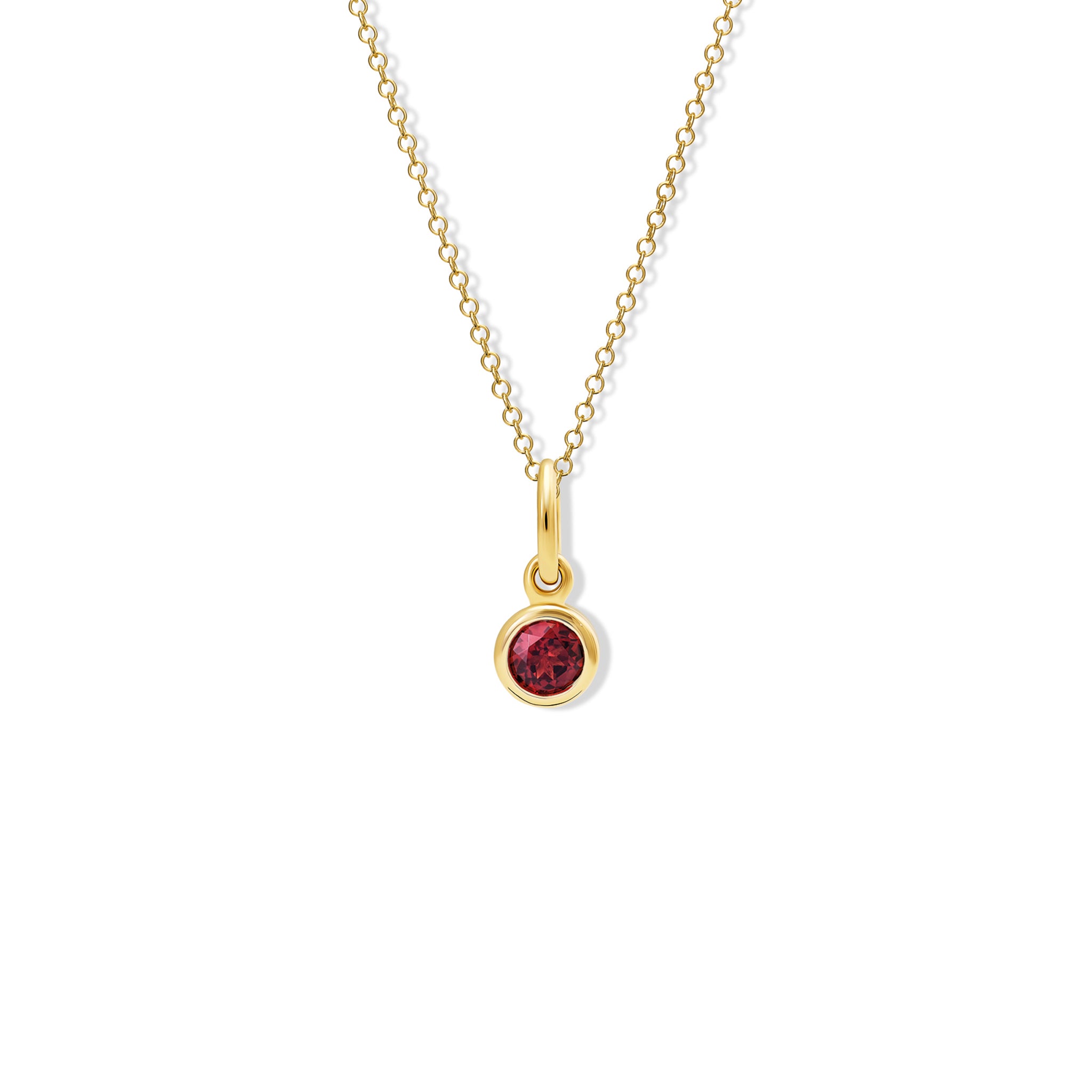 Handcrafted necklace pendant in yellow gold featuring a round ruby drop, birthstone of July.