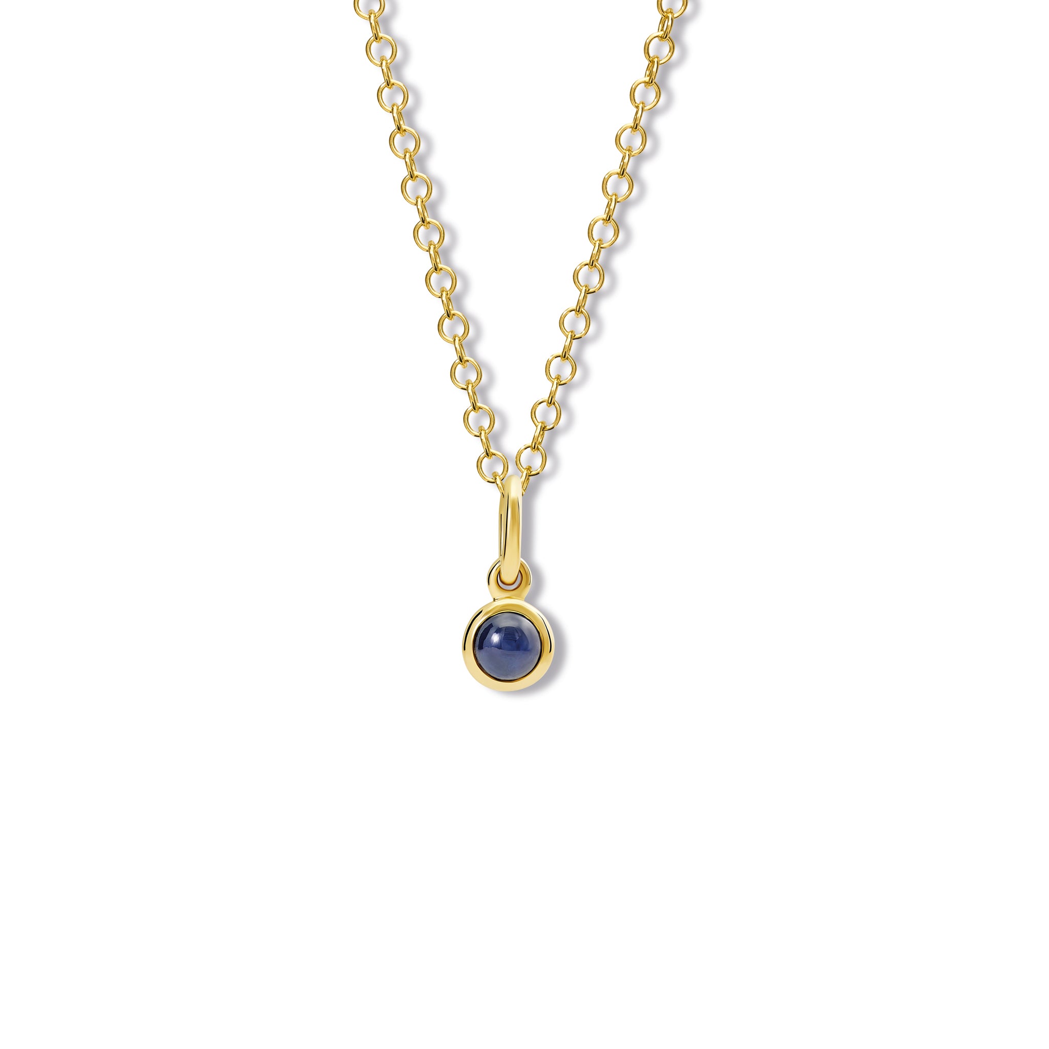 Handcrafted necklace pendant in yellow gold featuring a round cabochon sapphire drop, birthstone of September.