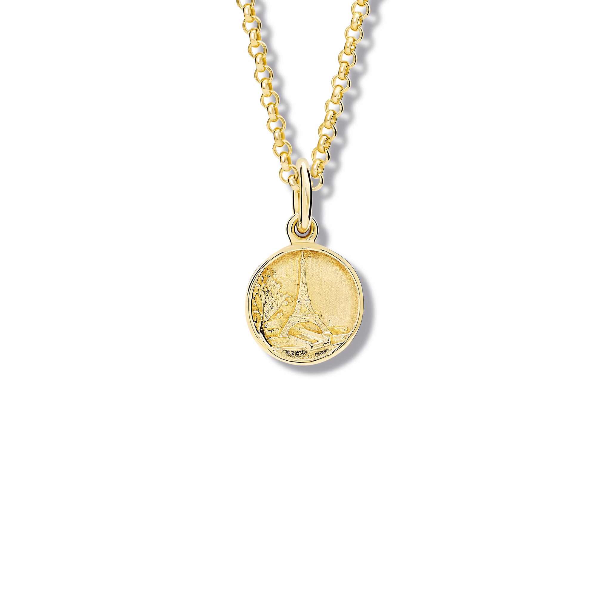 Handcrafted yellow gold necklace pendant 'en relief' with the eiffel tower in Paris, France.
