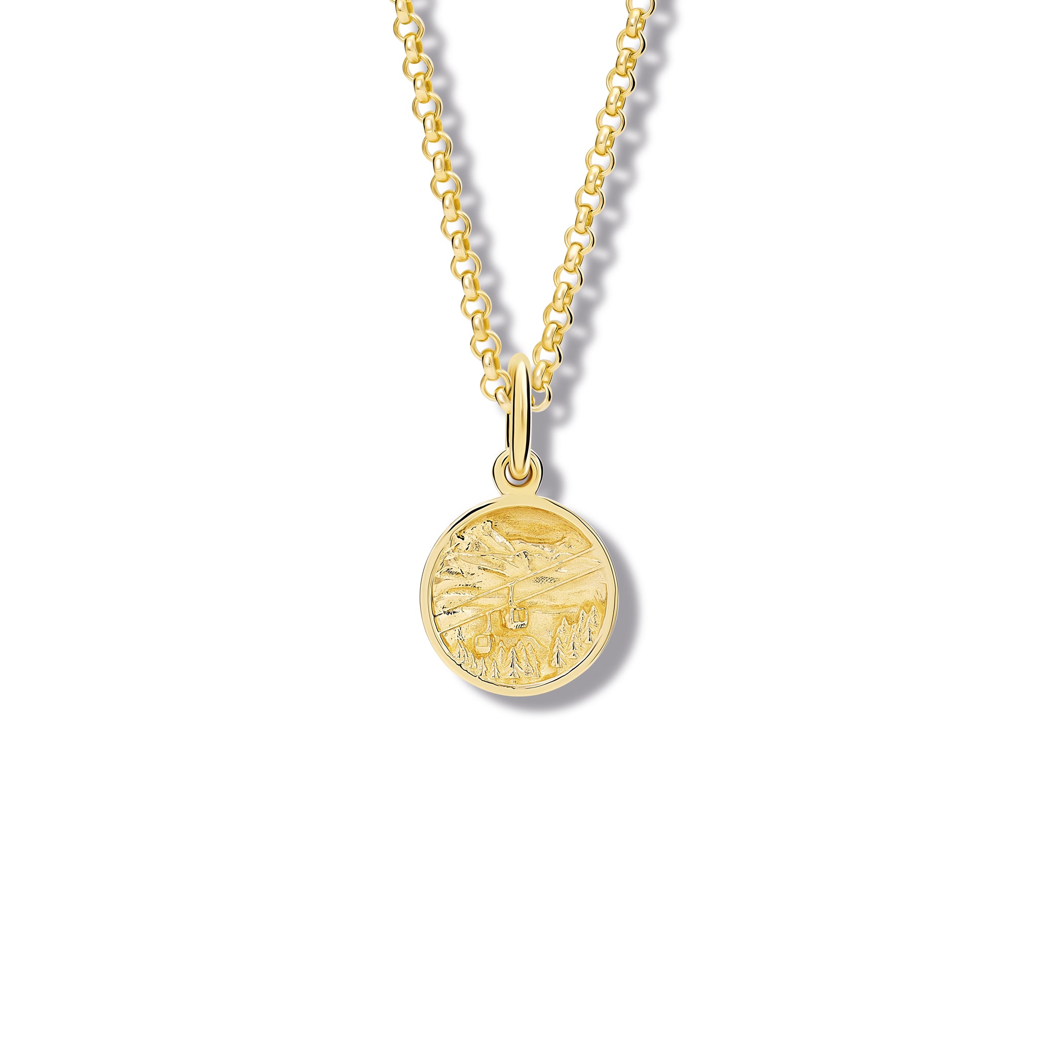 Handcrafted yellow gold necklace pendant 'en relief' with the mountains in France.