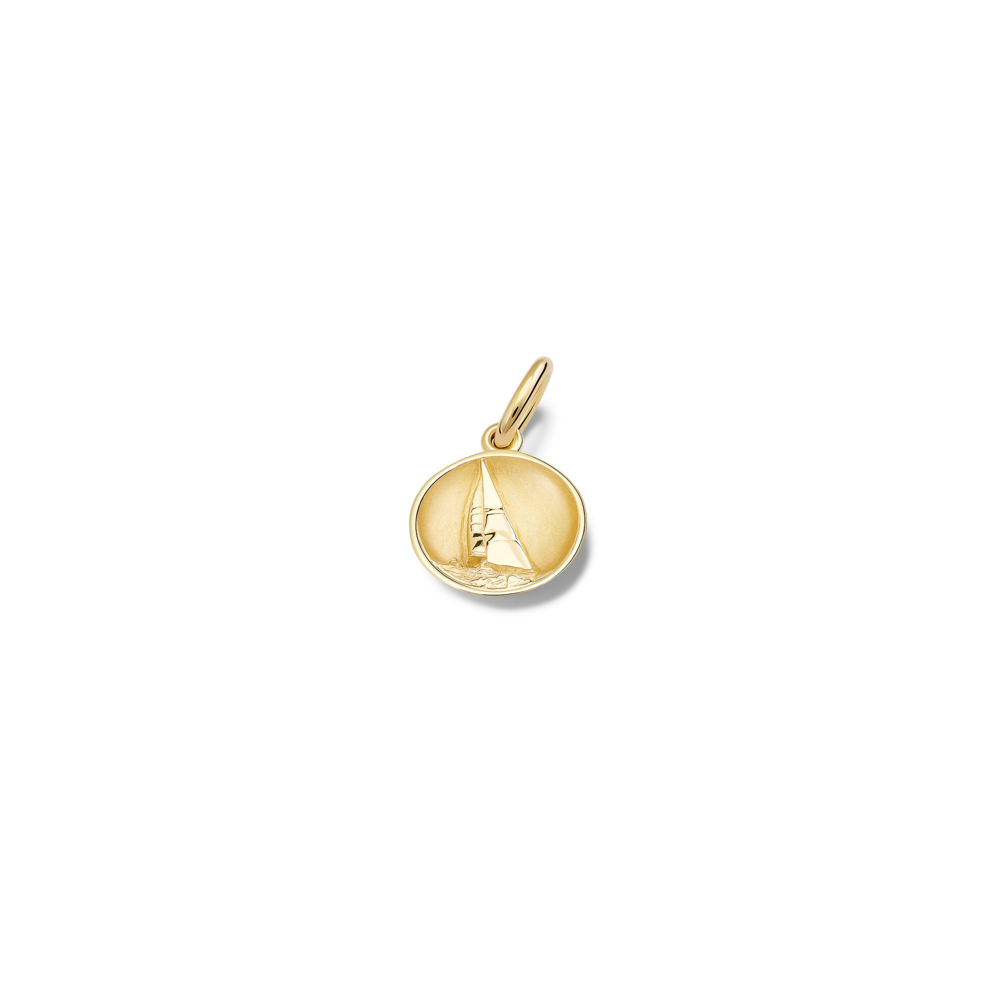 Handcrafted yellow gold necklace pendant 'en relief' with a sailing boat in France. 