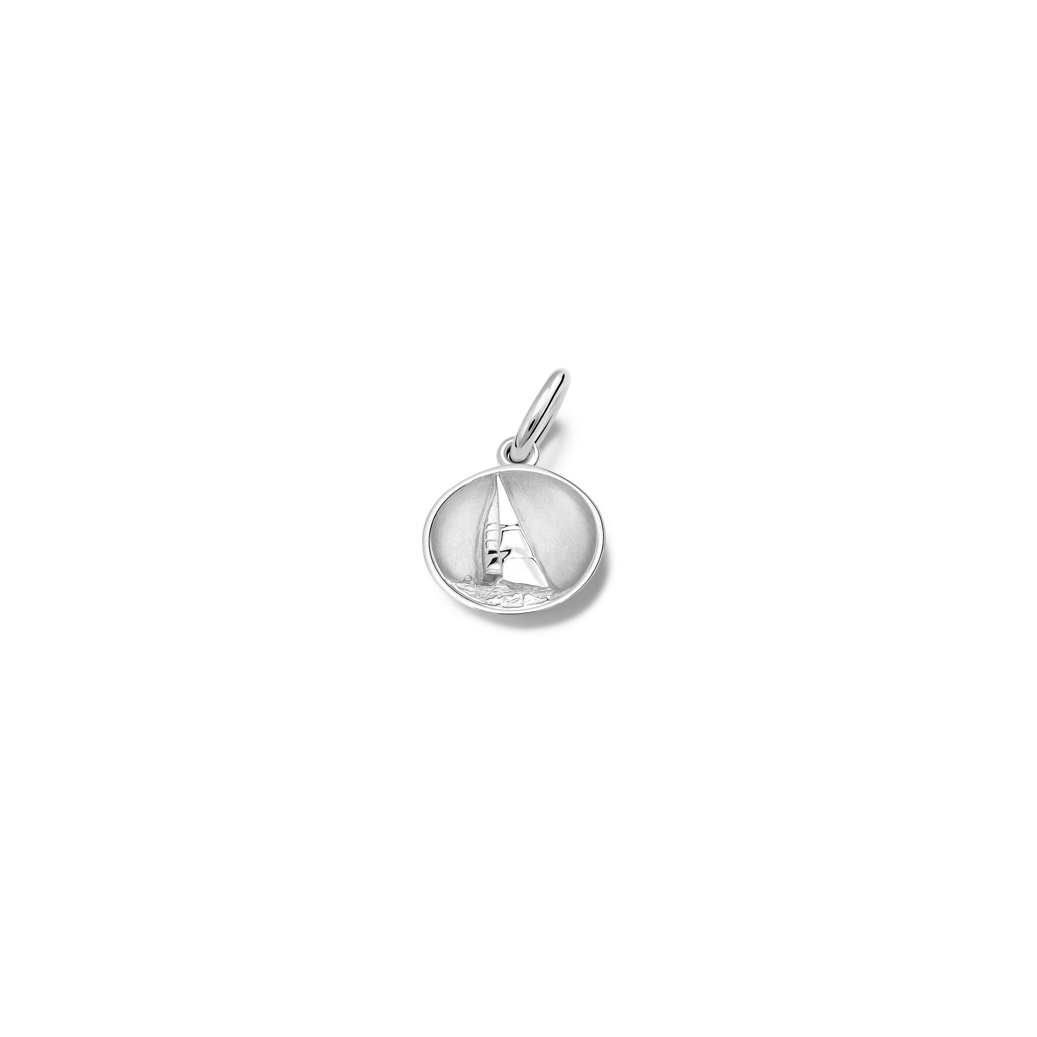 Handcrafted sterling silver necklace pendant 'en relief' with a sailing boat in France. 