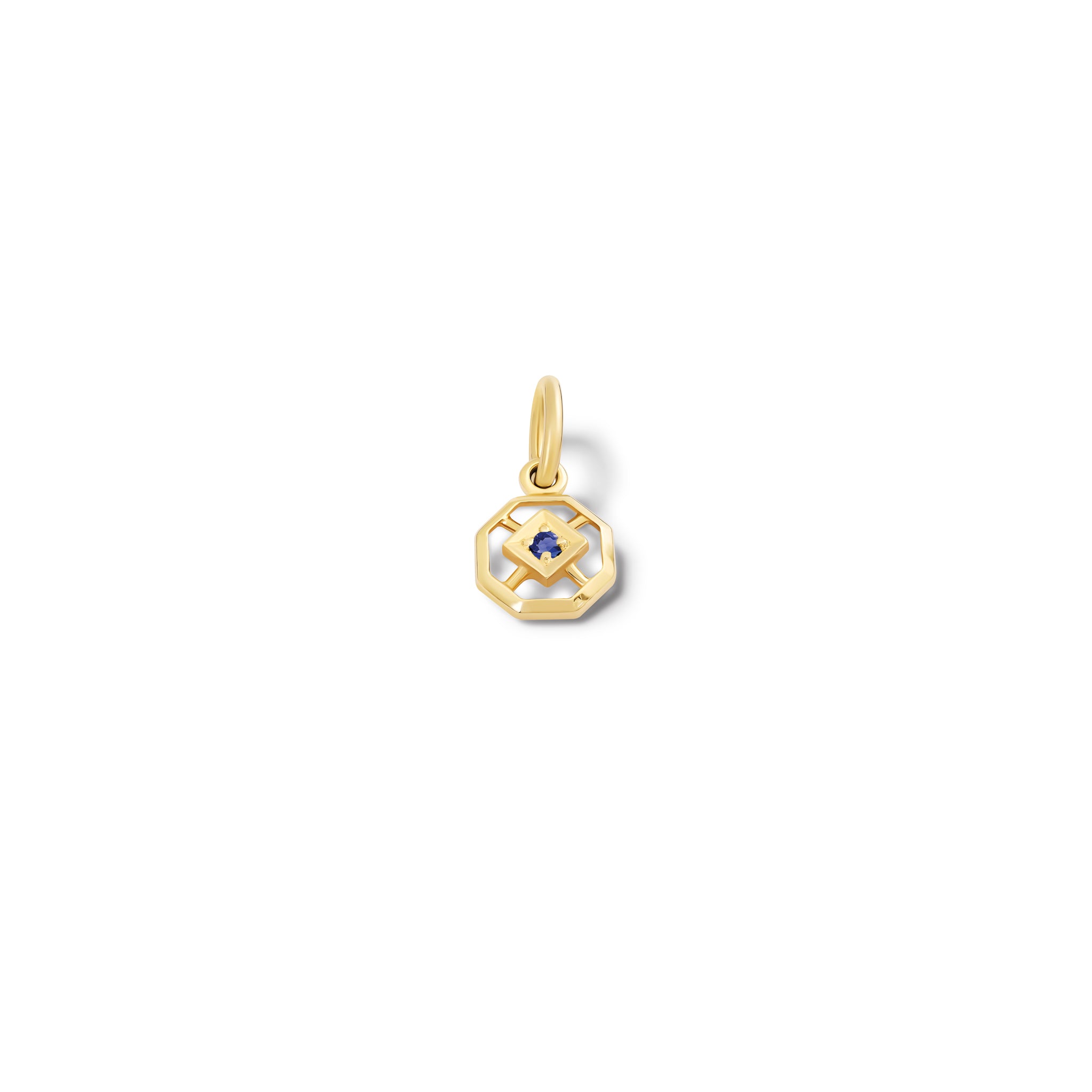 Handcrafted yellow gold necklace pendant featuring an octagonal design with a central sapphire, birthstone of September.