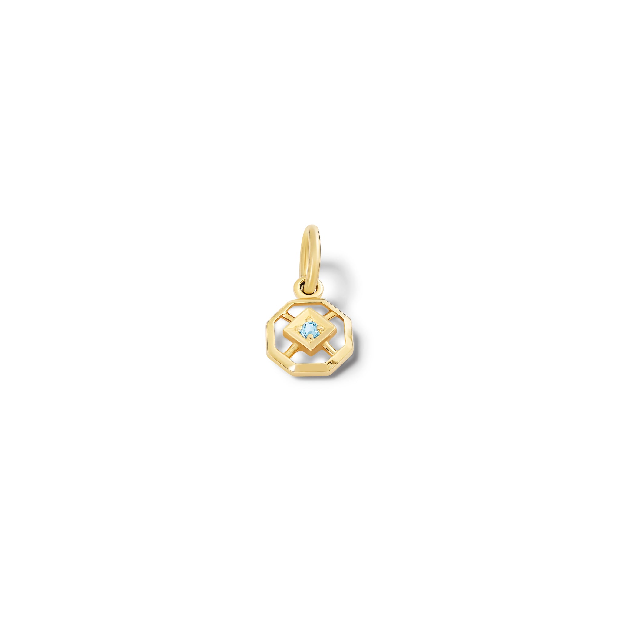 Handcrafted yellow gold necklace pendant featuring an octagonal design with a central blue topaz, birthstone of November.