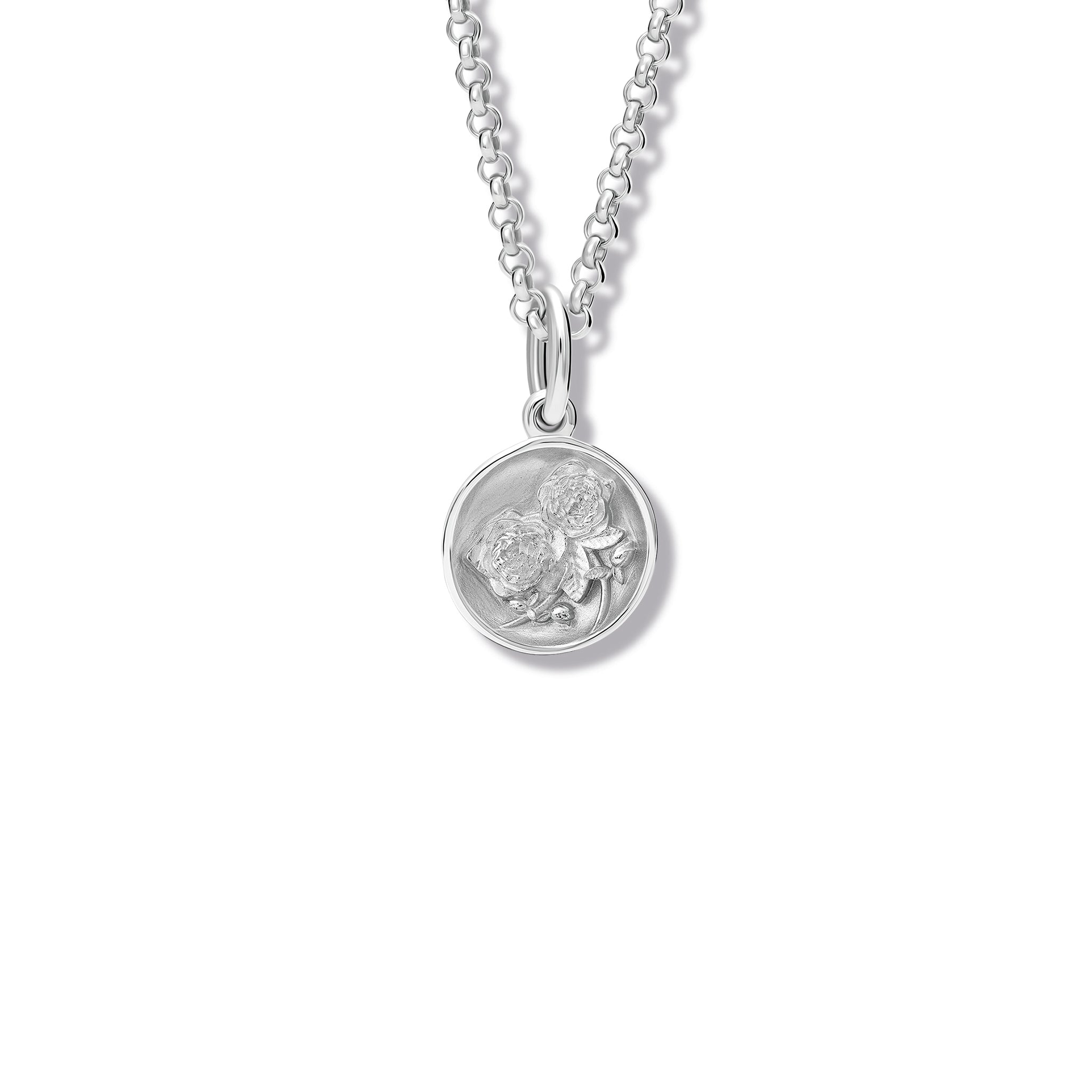 Handcrafted sterling silver necklace pendant 'en relief' with a rose.
