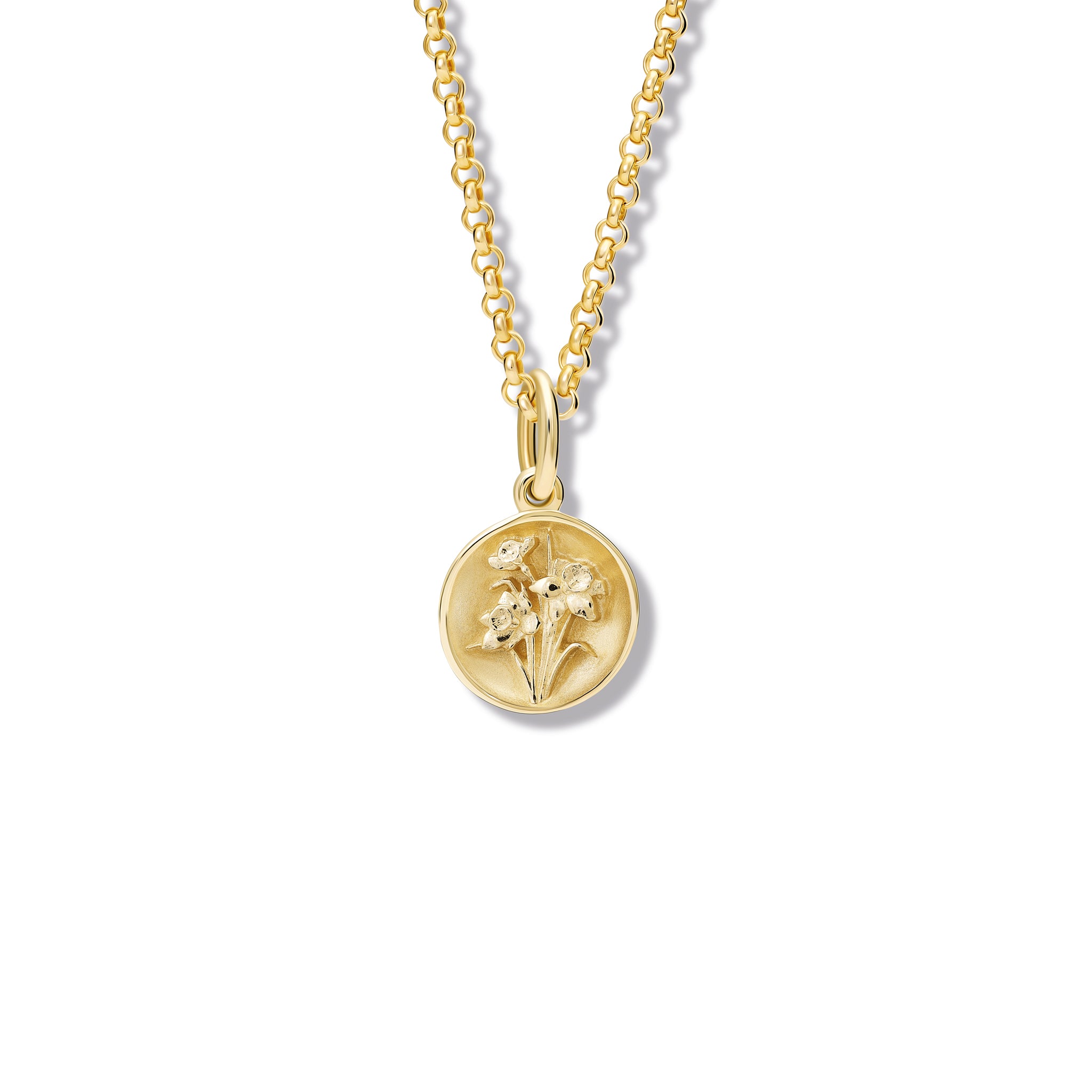 Handcrafted round yellow gold necklace pendant featuring an 'en relief' daffodil flower. 