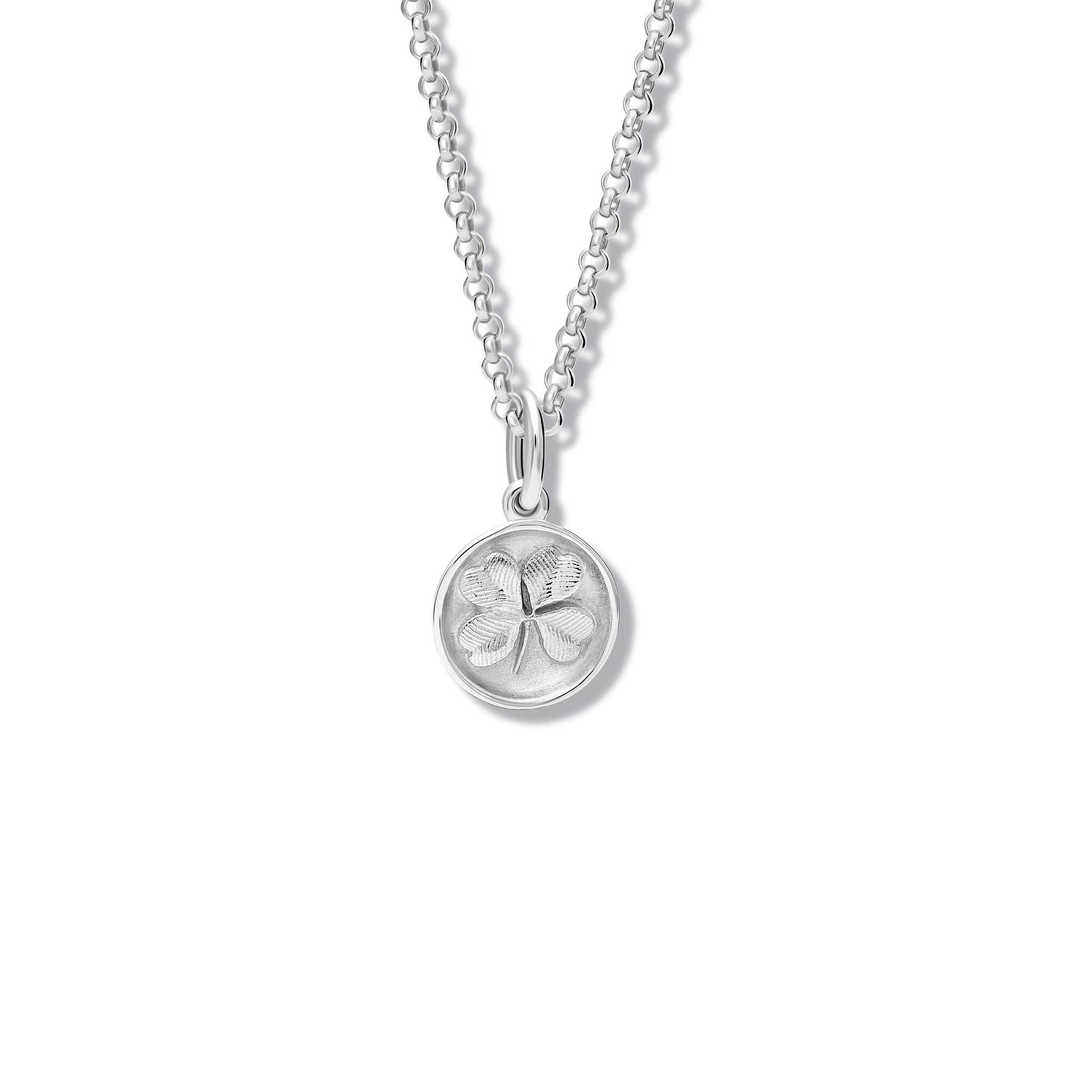 Handcrafted sterling silver necklace pendant 'en relief' with a shamrock.
