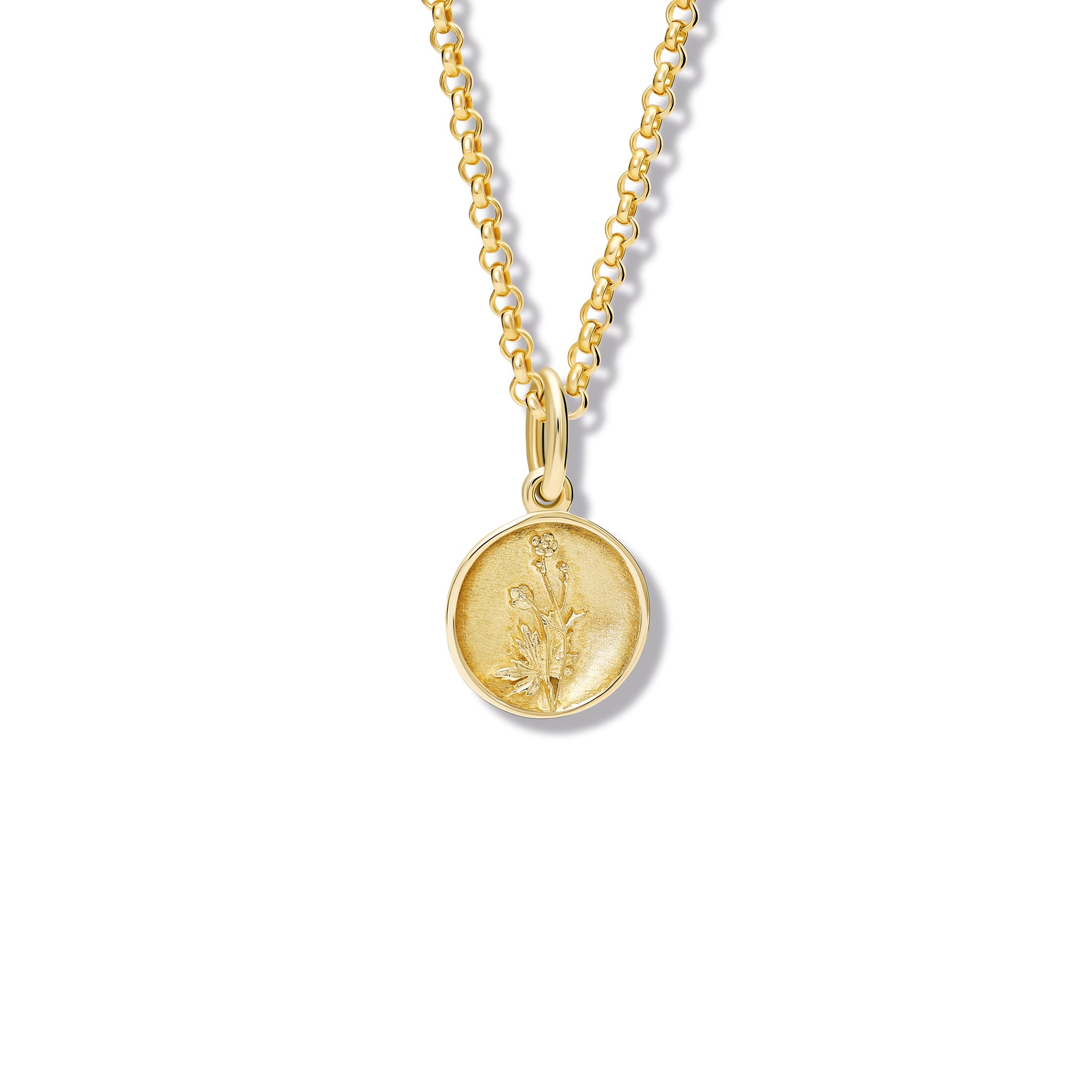 Handcrafted yellow gold necklace pendant 'en relief' with a thistle.
