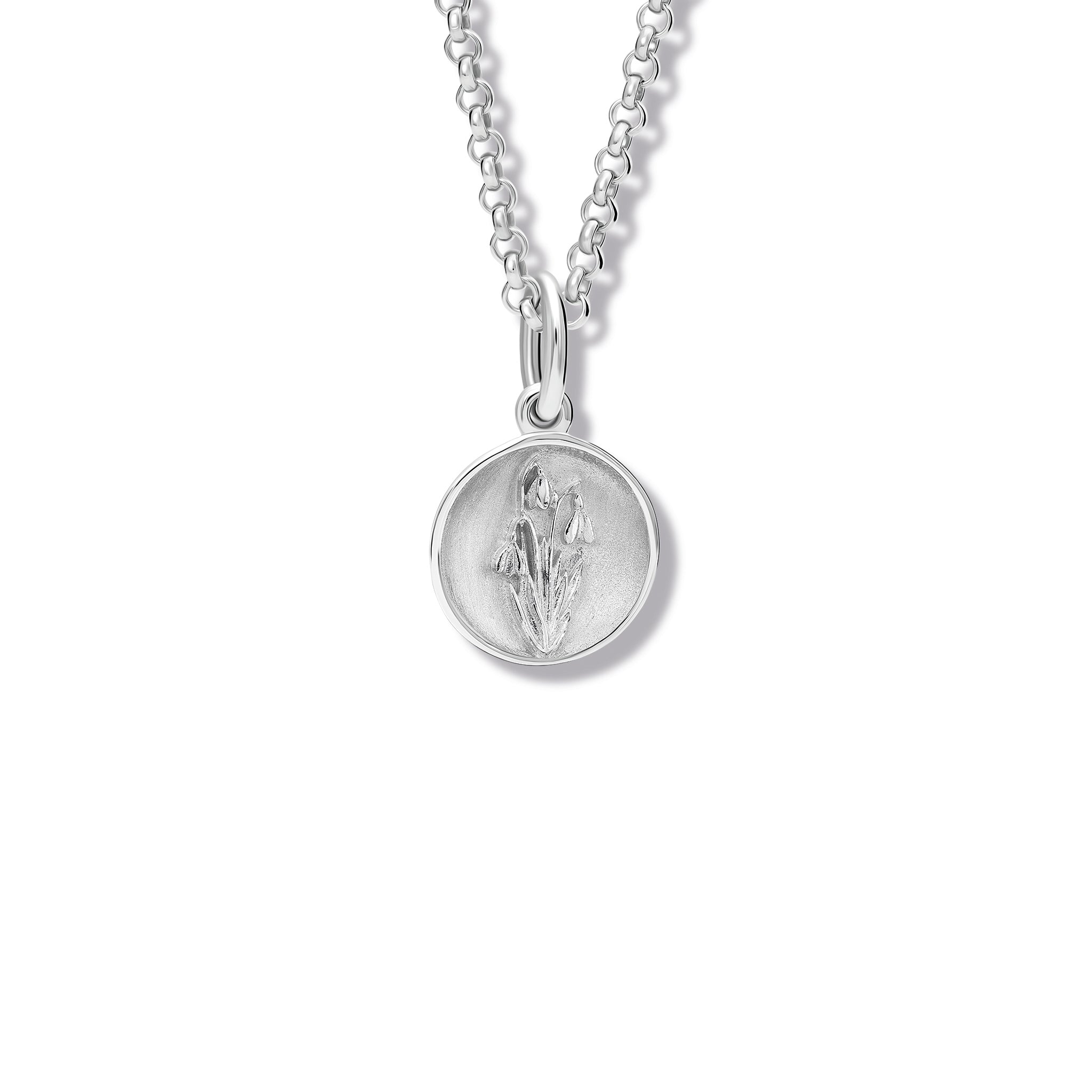 Handcrafted sterling silver necklace pendant 'en relief' with a snowdrop.
