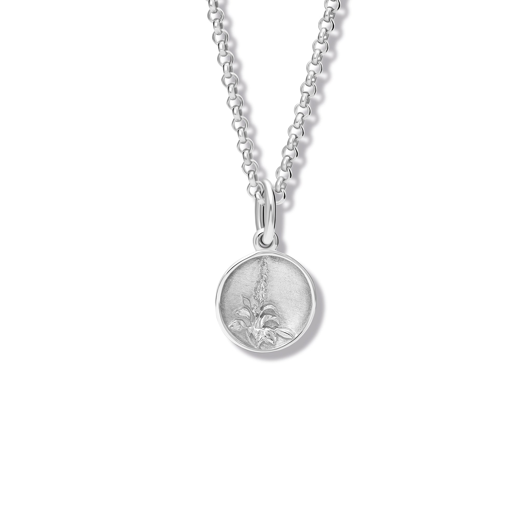 Handcrafted round sterling silver necklace pendant 'en relief' with a foxglove.