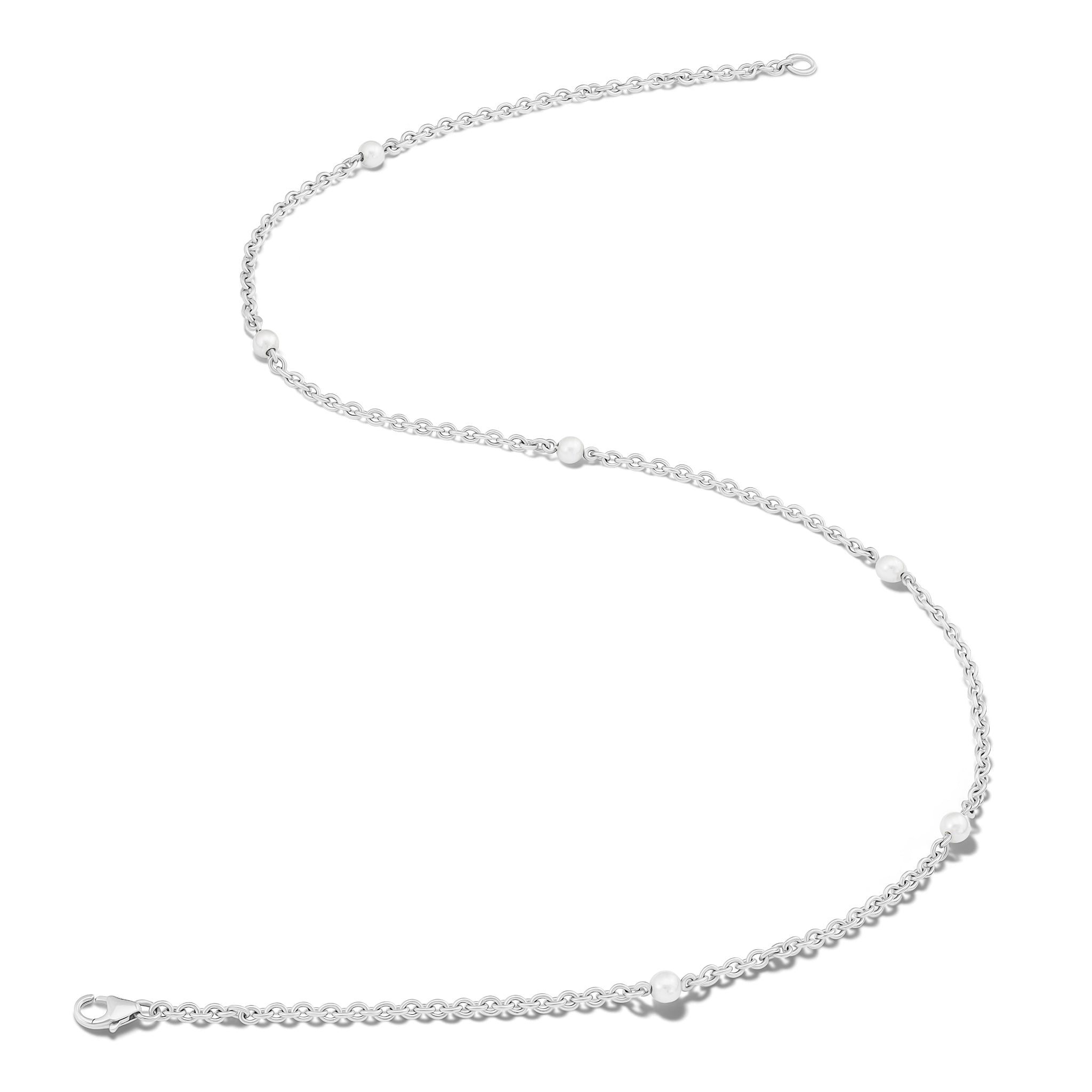 Handcrafted sterling silver necklace chain featuring small circular links with pearls.