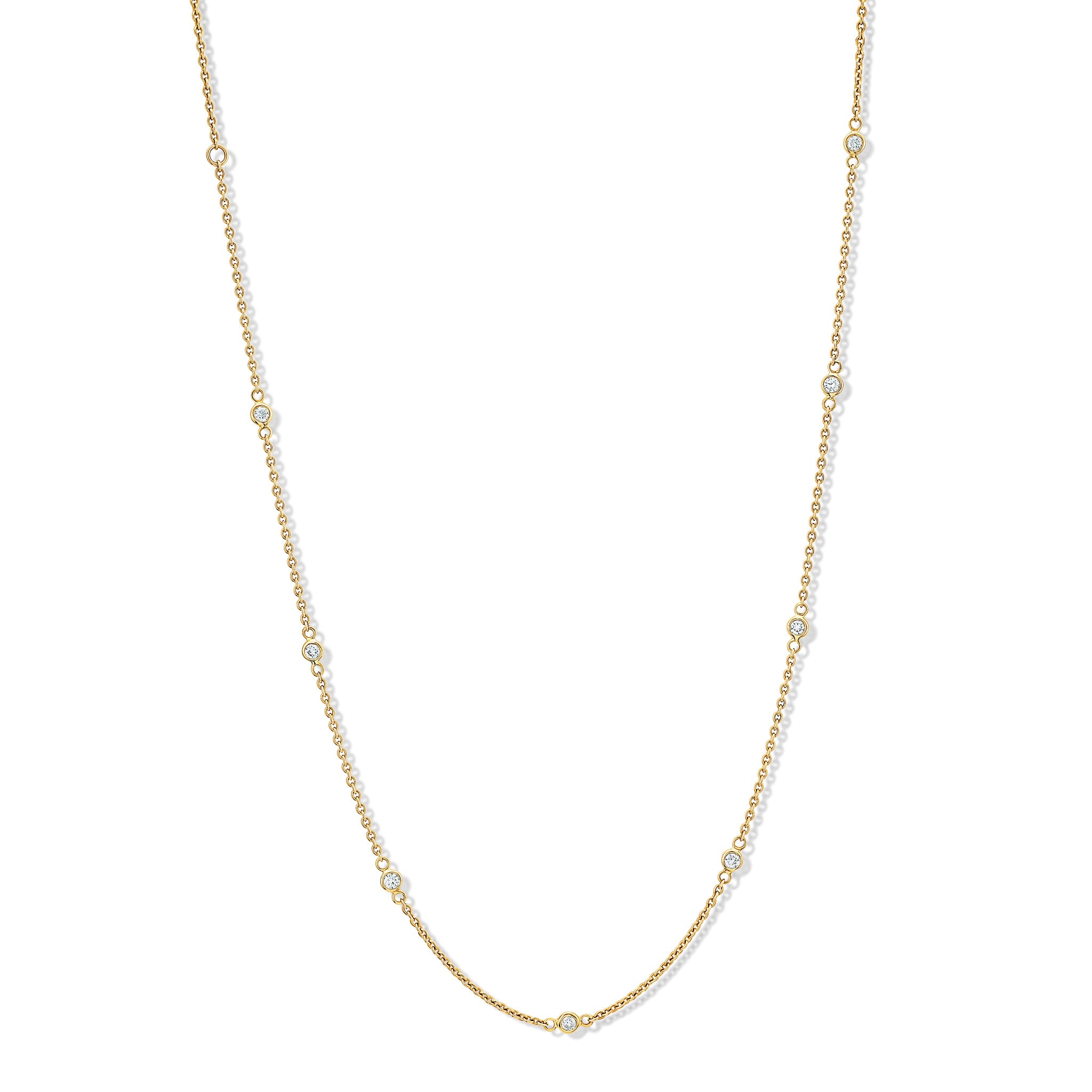 Handcrafted yellow gold necklace chain with round facetted diamonds.