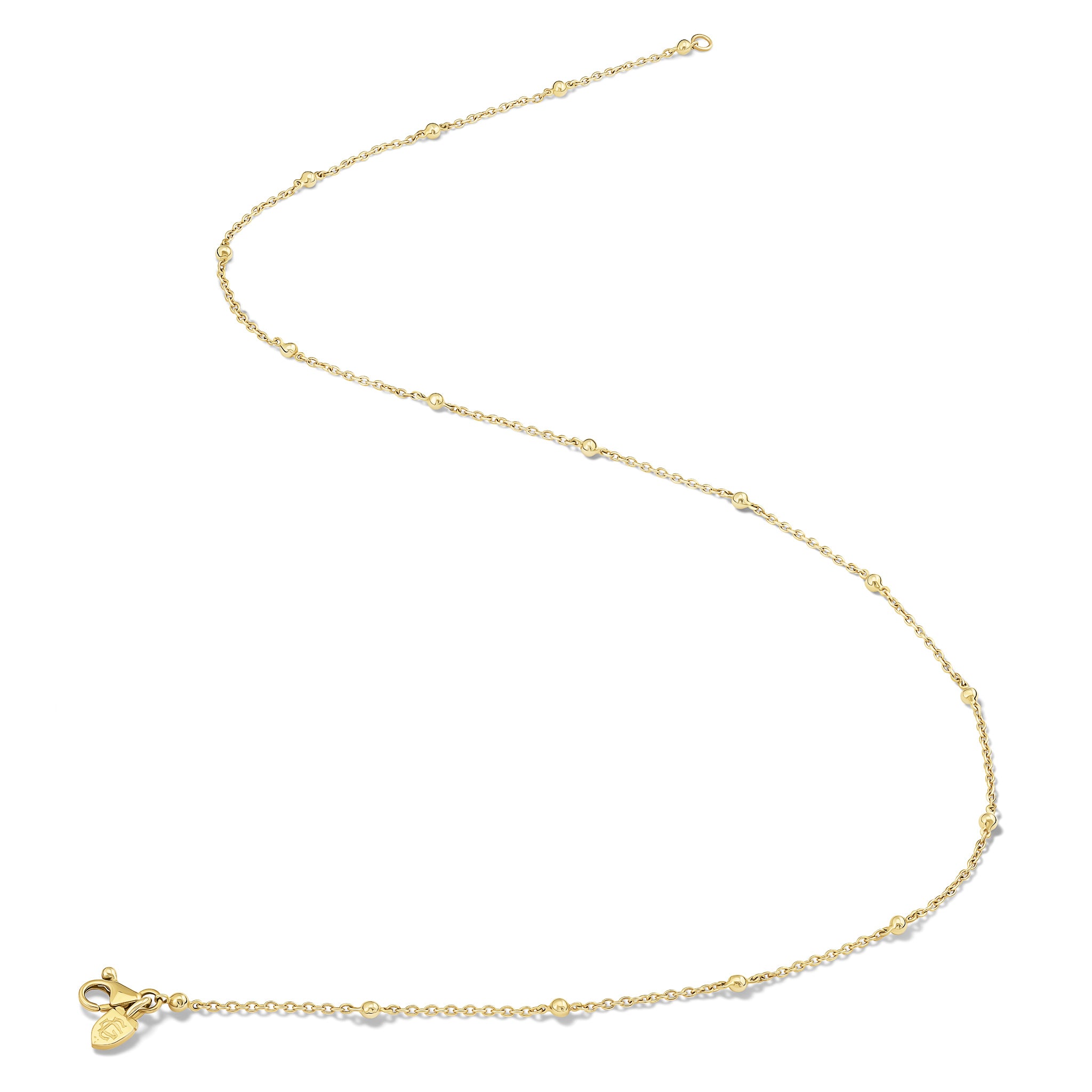 Handcrafted yellow gold necklace chain with small gold beads.