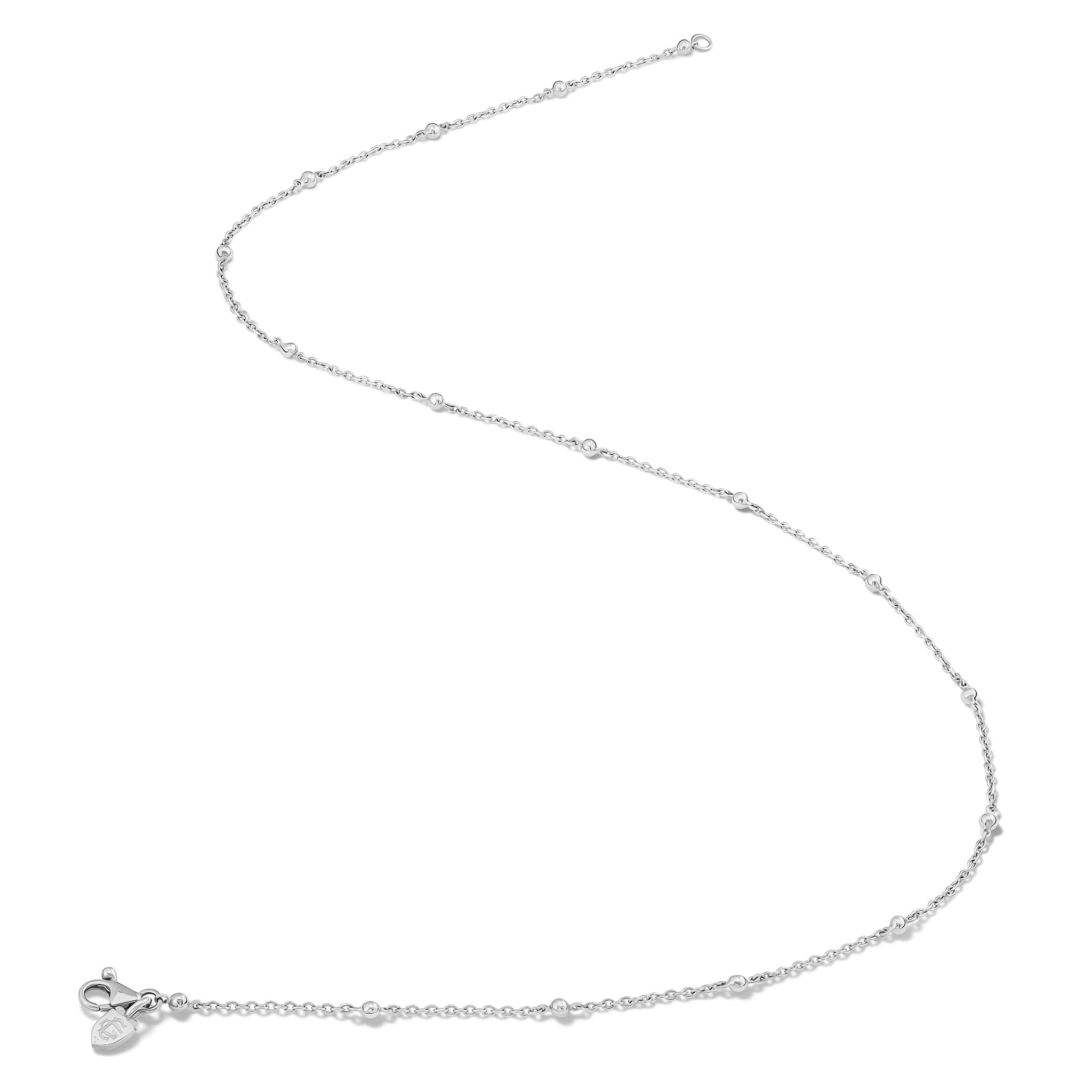 Handcrafted white gold necklace chain with small gold beads.