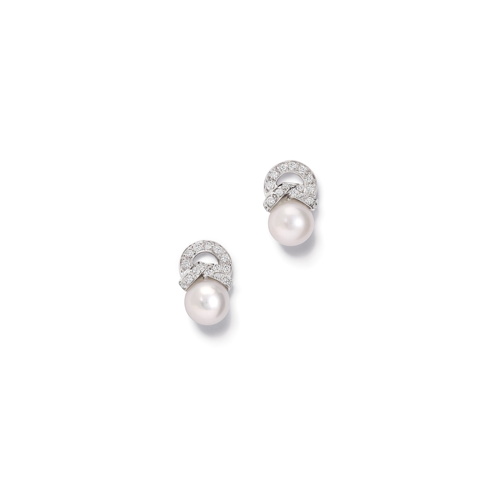 Handcrafted 18ct white gold earrings with a pearl and diamond pavé. 