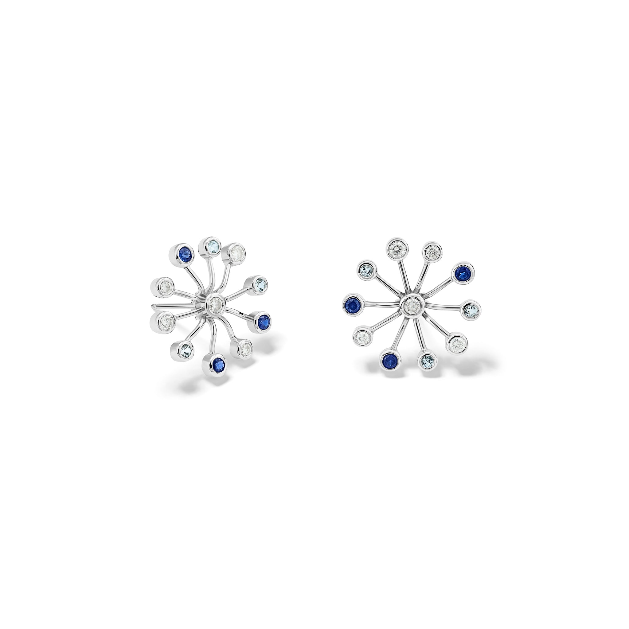 Handcrafted 18ct white gold earrings inspired by the delicate spurs of an astrantia flower, with sapphires, aquamarines and diamonds set at the tip of each spur.