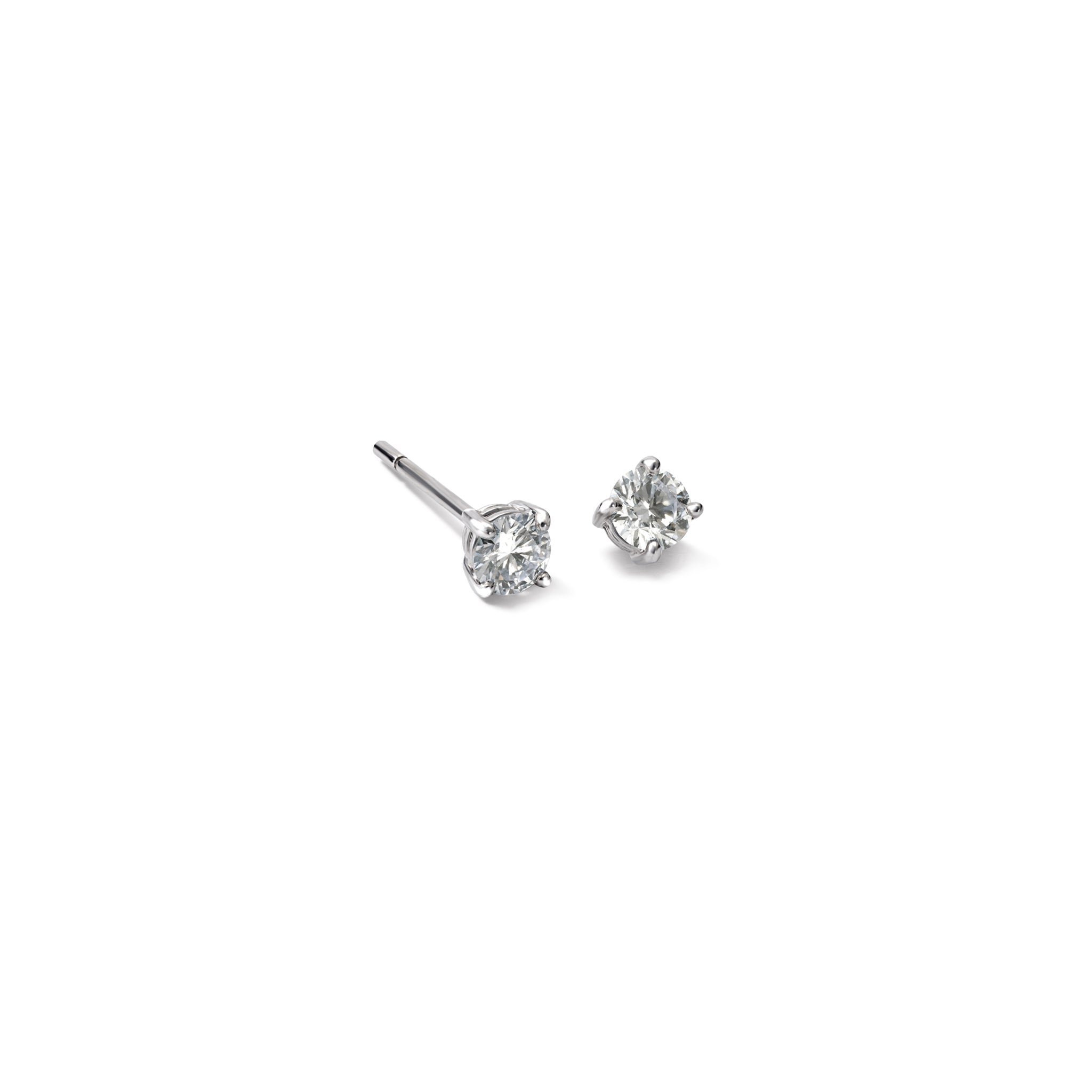 Handcrafted white gold stud earrings featuring claw set diamonds.