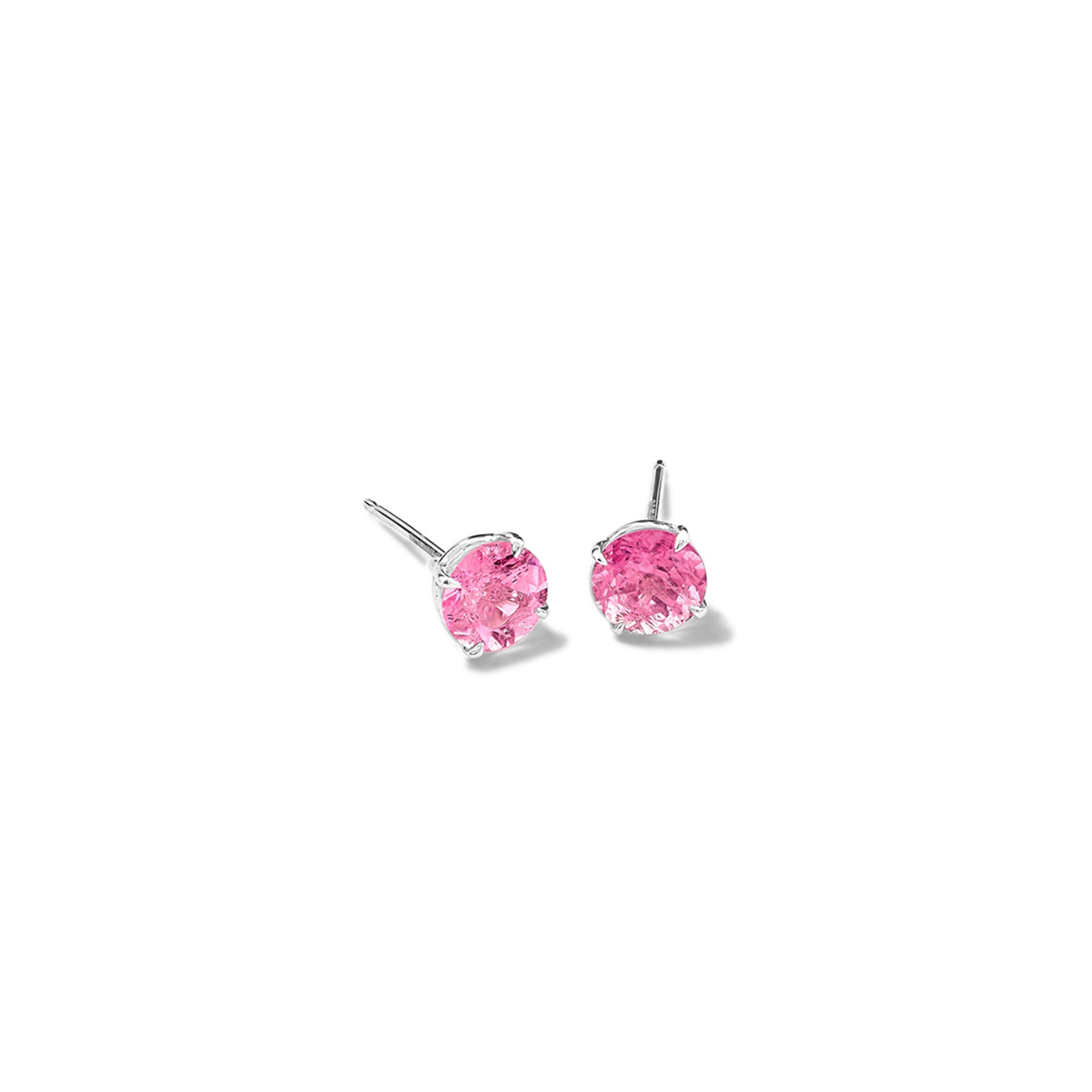 Handcrafted white gold stud earrings featuring round pale pink tourmalines, the birthstone of October.