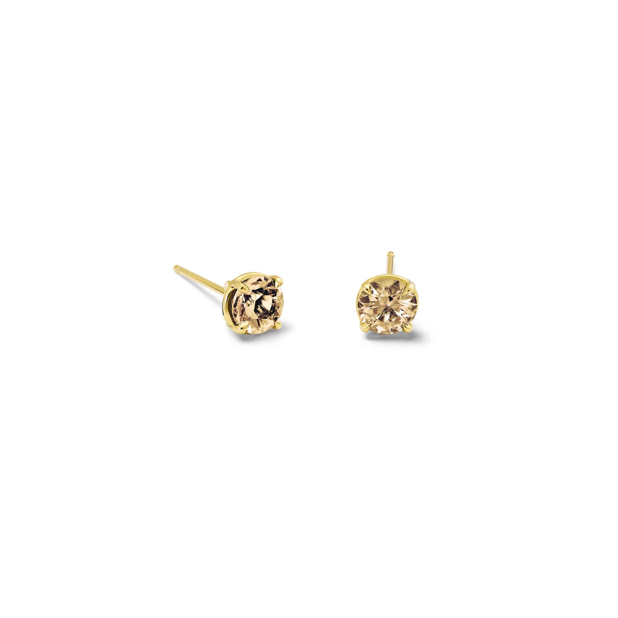 Handcrafted 18ct yellow gold stud earrings featuring round champagne diamonds, birthstone of April.