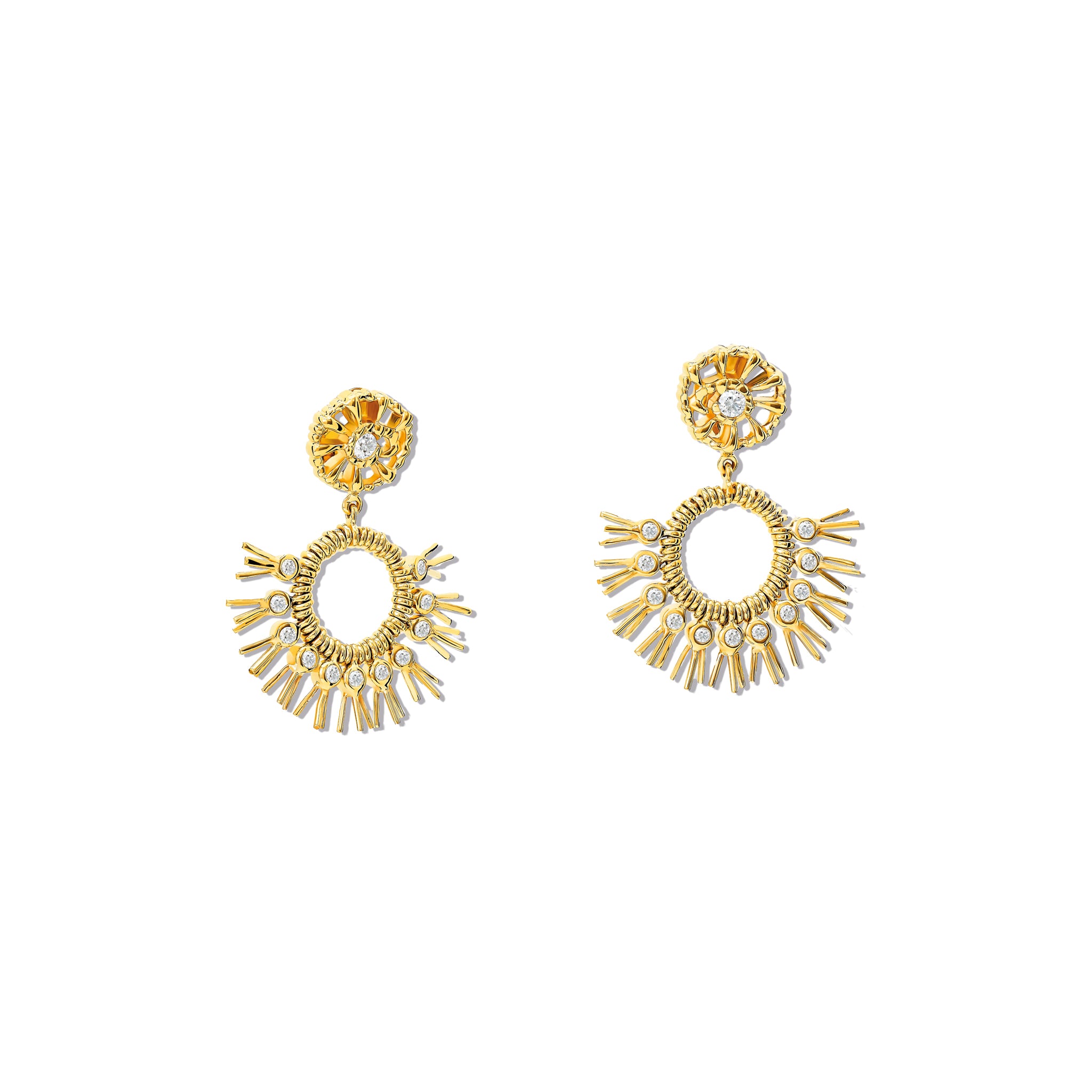 Handcrafted yellow gold earrings with diamonds in the shape of dried palm fronds from Morocco.
