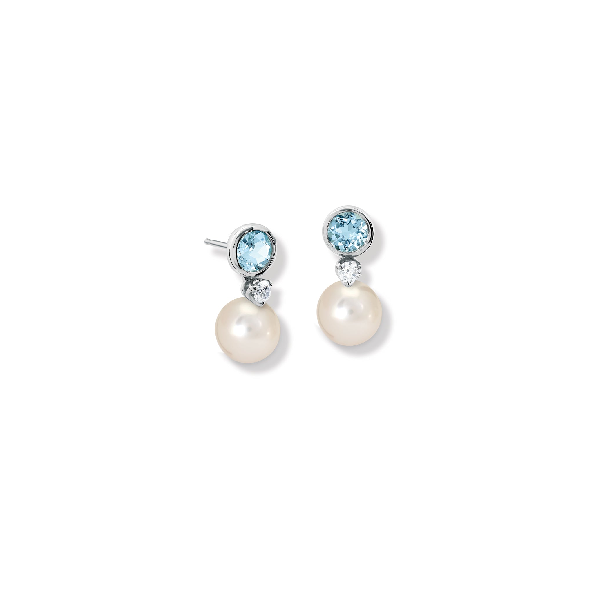 Handcrafted white gold halo earring drops with a pearl and diamond.