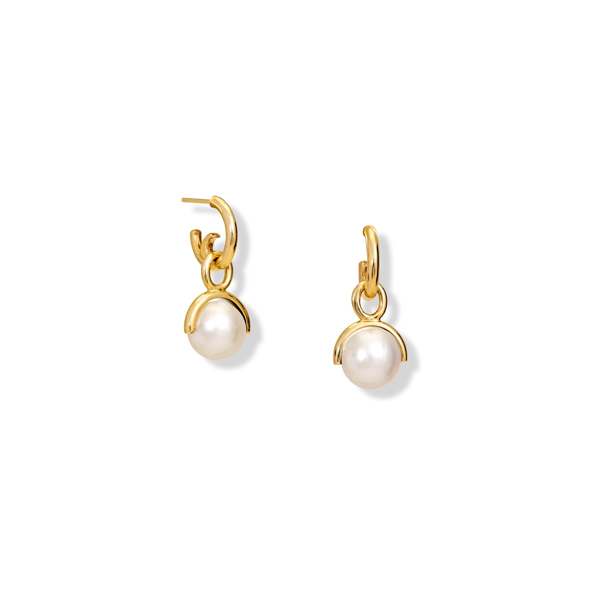 Handcrafted yellow gold earring drops featuring dangling pearls, birthstone of June.