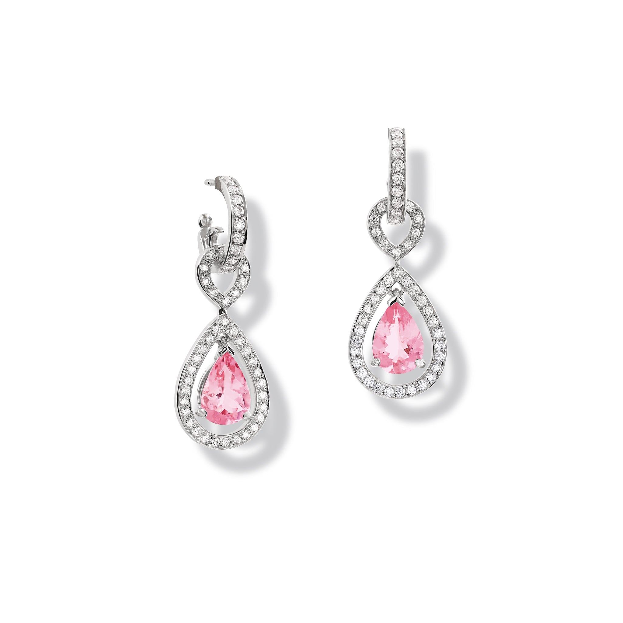 Handcrafted 18ct white gold earring drops featuring a central pink sapphire surrounded by diamonds.