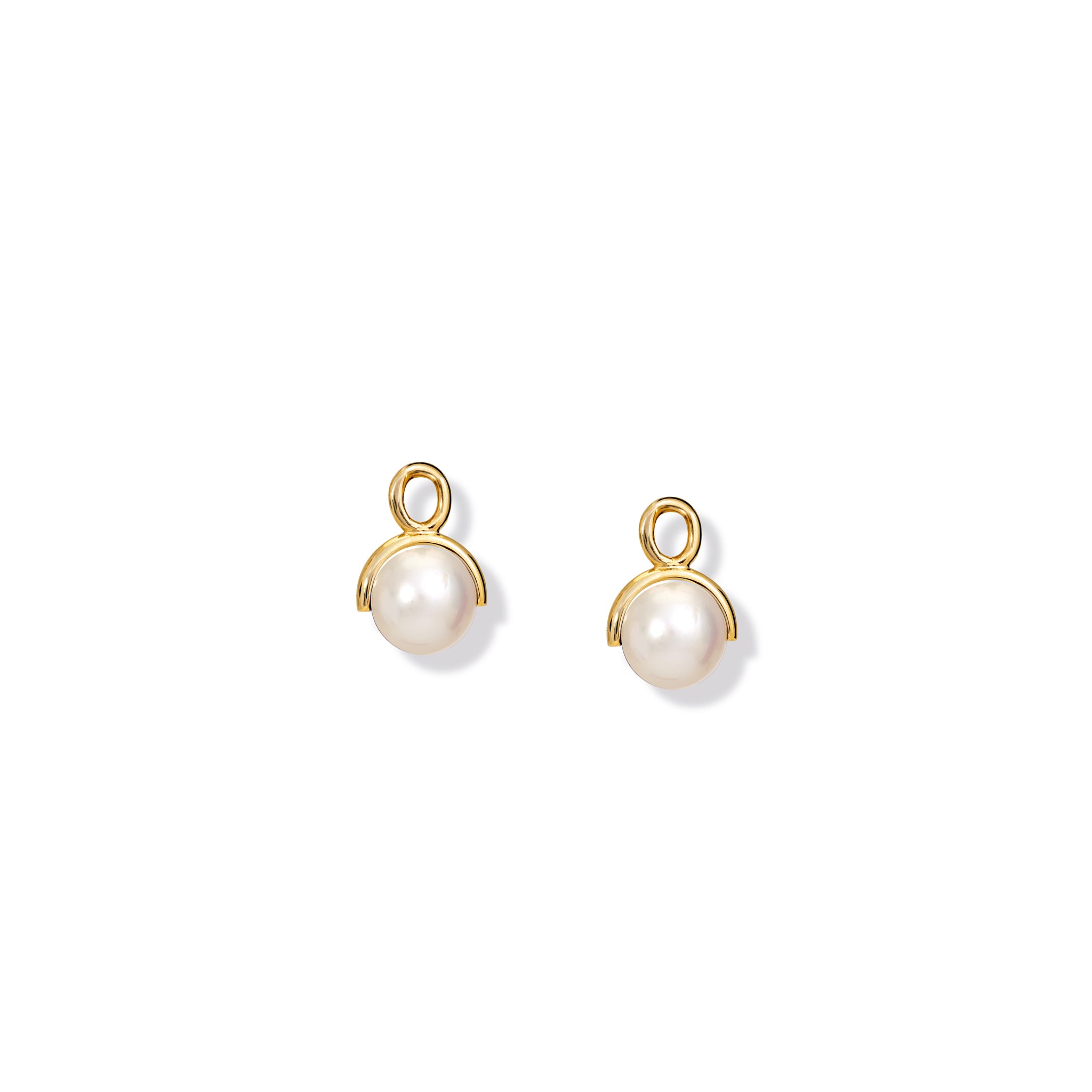 Handcrafted yellow gold earring drops featuring dangling pearls, birthstone of June.