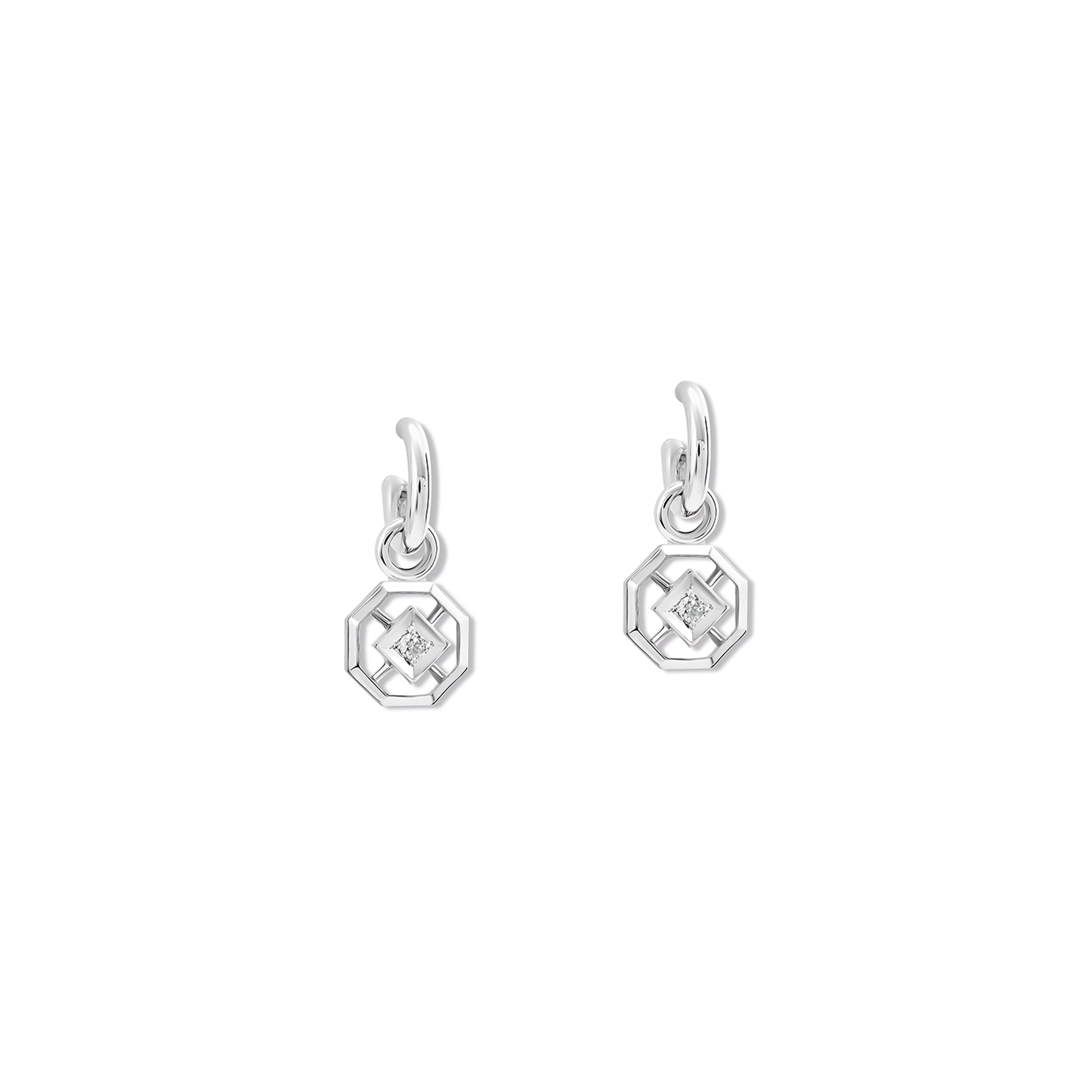 Handcrafted white gold earring drops featuring an octagonal design with a central diamond, birthstone of April.