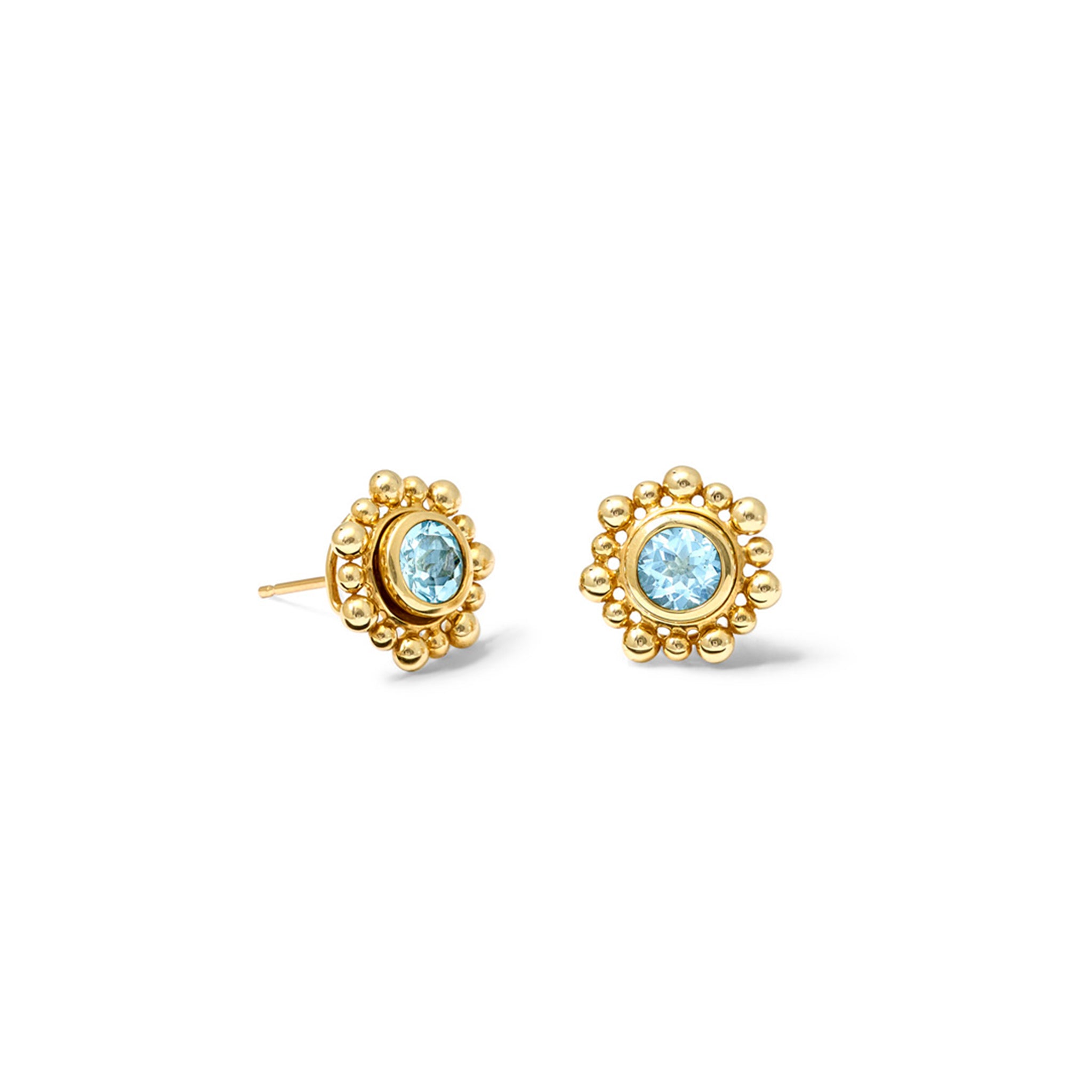 Handcrafted yellow gold earring halos adorned with closely spaced circular beads.