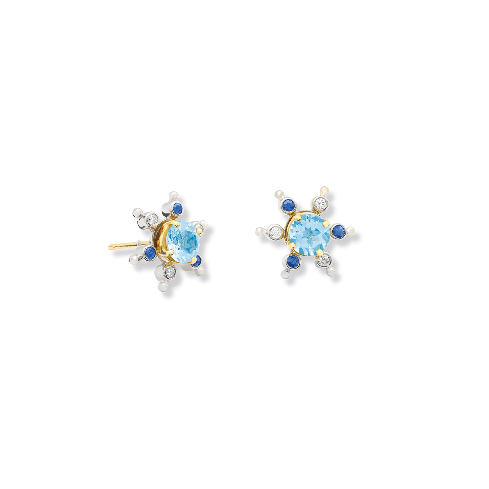 Handcrafted white gold earring halos inspired by a cactus, featuring six prongs, set small sapphires and diamonds.