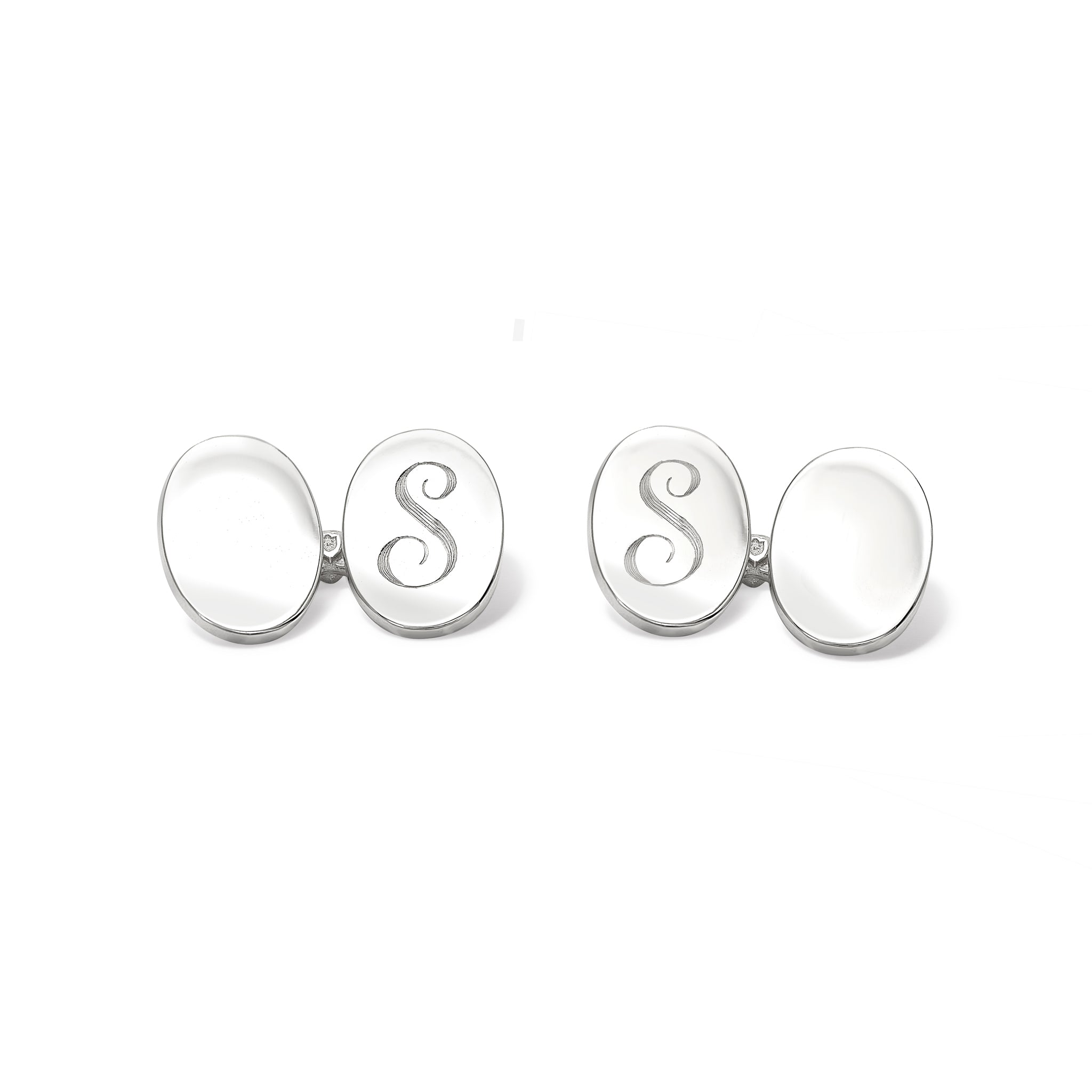 Handcrafted sterling silver double ended cufflinks featuring a plain oval shape.