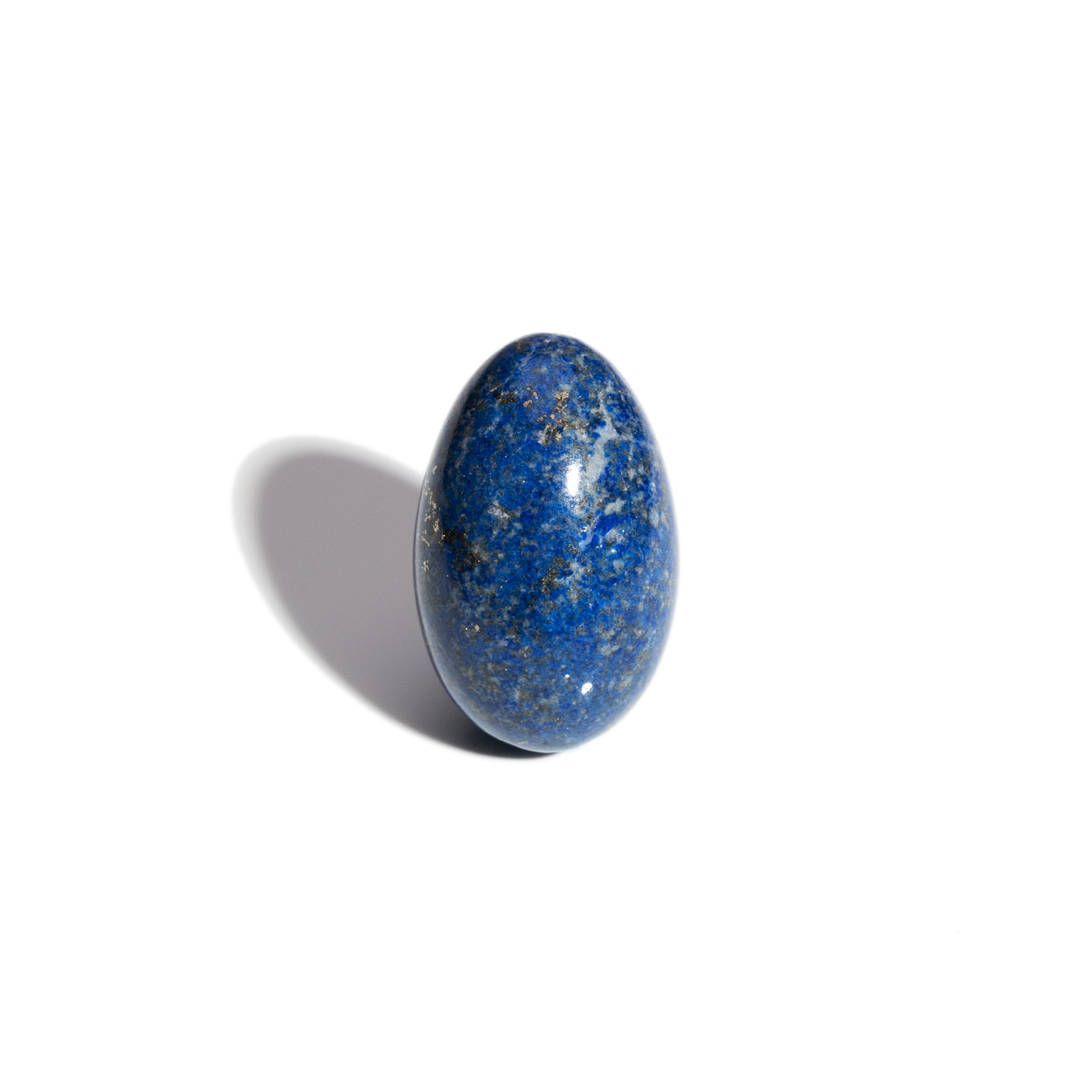 A handcrafted gemstone egg in the precious stone lapis lazuli. 