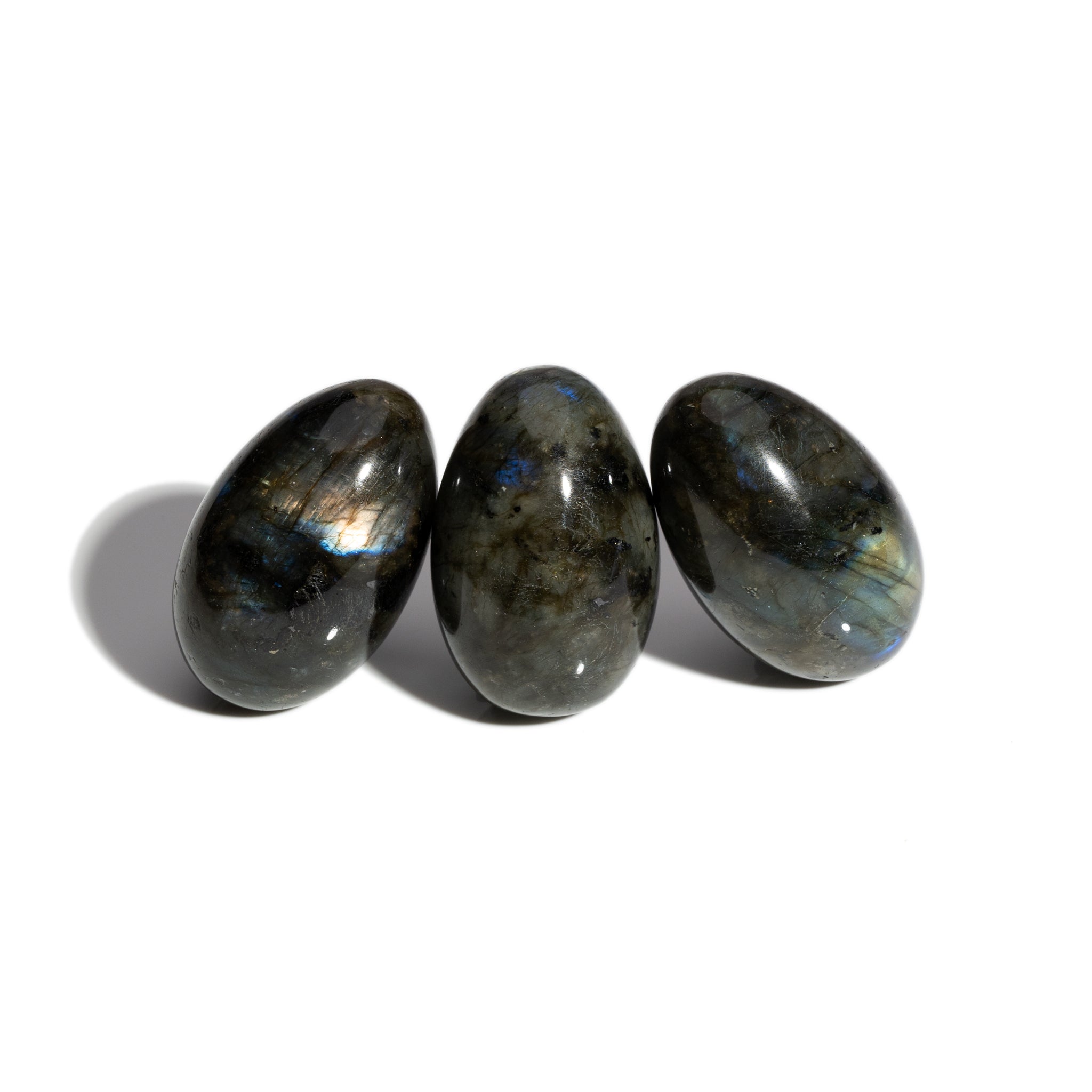 Three handcrafted gemstone eggs in the precious stone labradorite. 