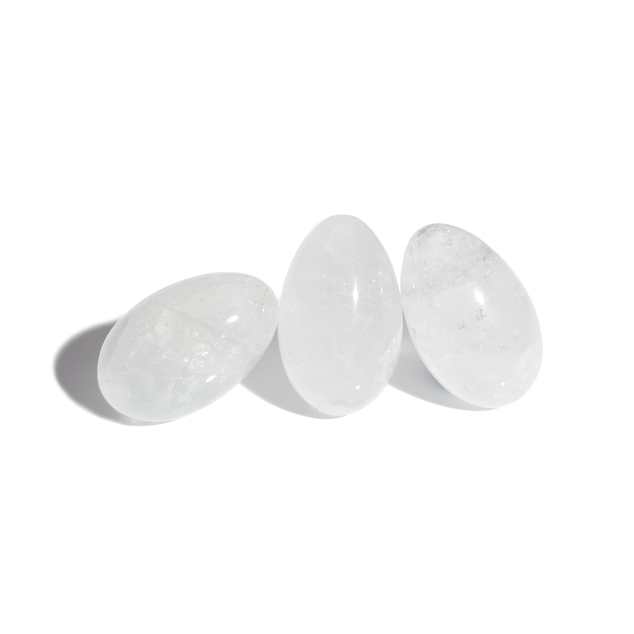 Three handcrafted gemstone eggs in the precious cloudy quartz. 