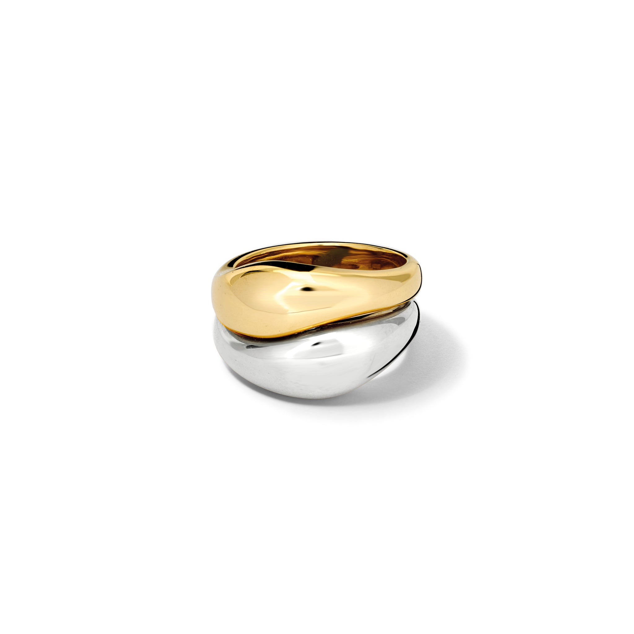 Handcrafted sterling silver and yellow gold rings with a slight teardrop design at the top. 